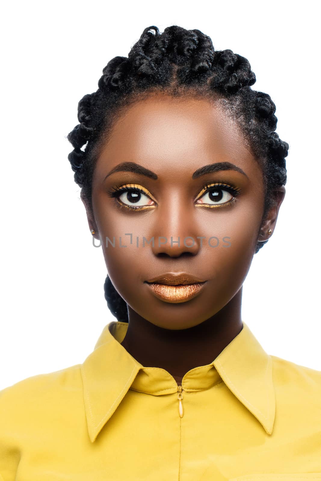 Macro close up beauty portrait of attractive young african woman.Front view of girl looking at camera isolated against white background.