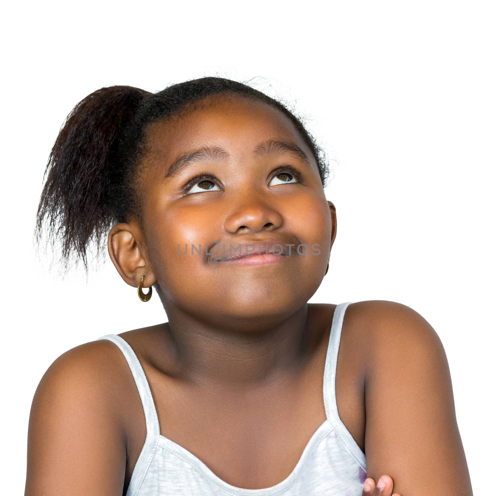 Cute african girl looking up isolated. by karelnoppe