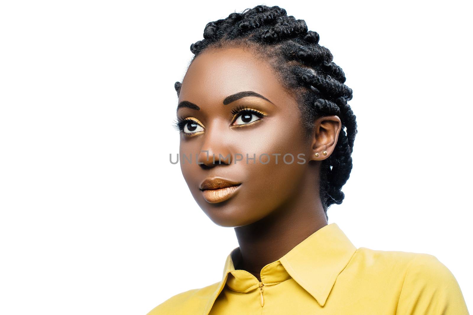 Close up beauty portrait of attractive young african woman wearing professional make up.Girl with stylish braided hairstyle isolated on white background.