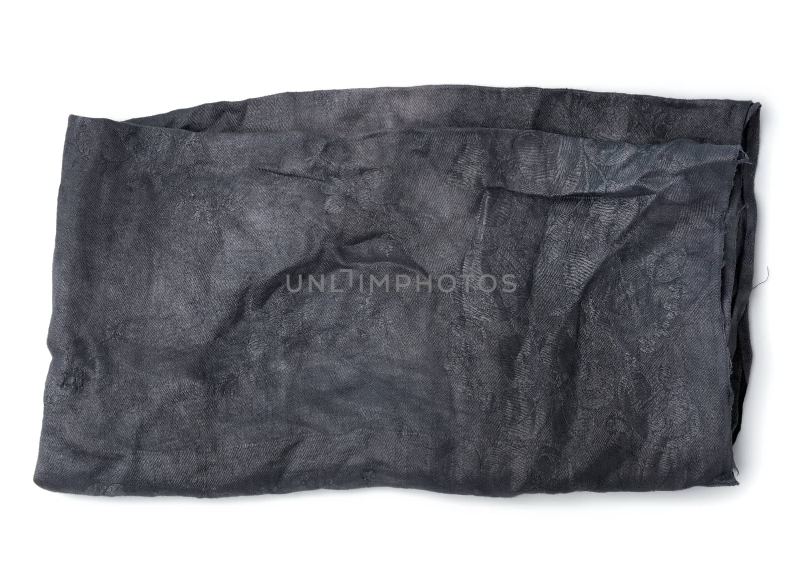 folded black cotton fabric isolated on white background, top view