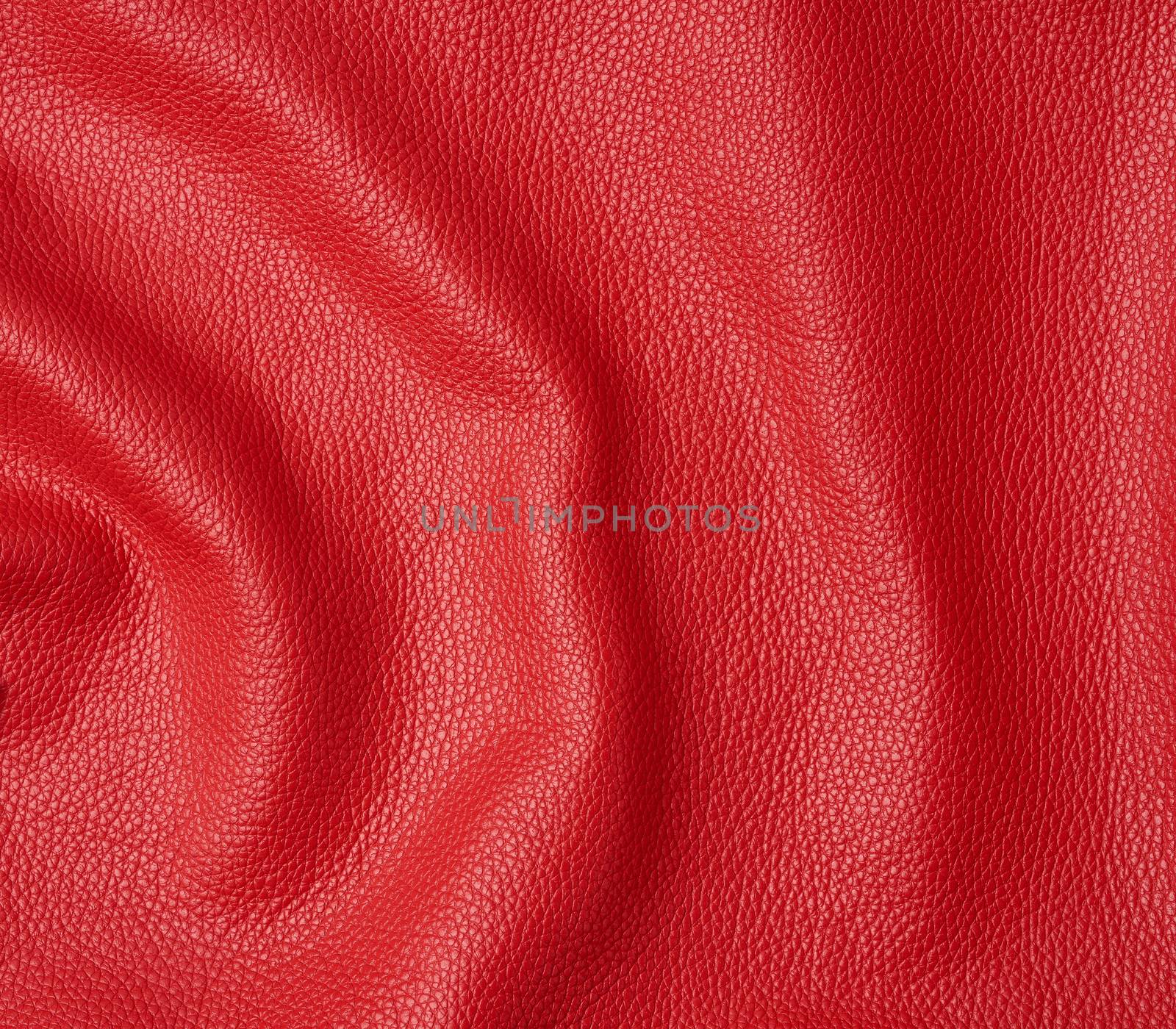 natural bright red cowhide texture, full frame, scarlet color, close up