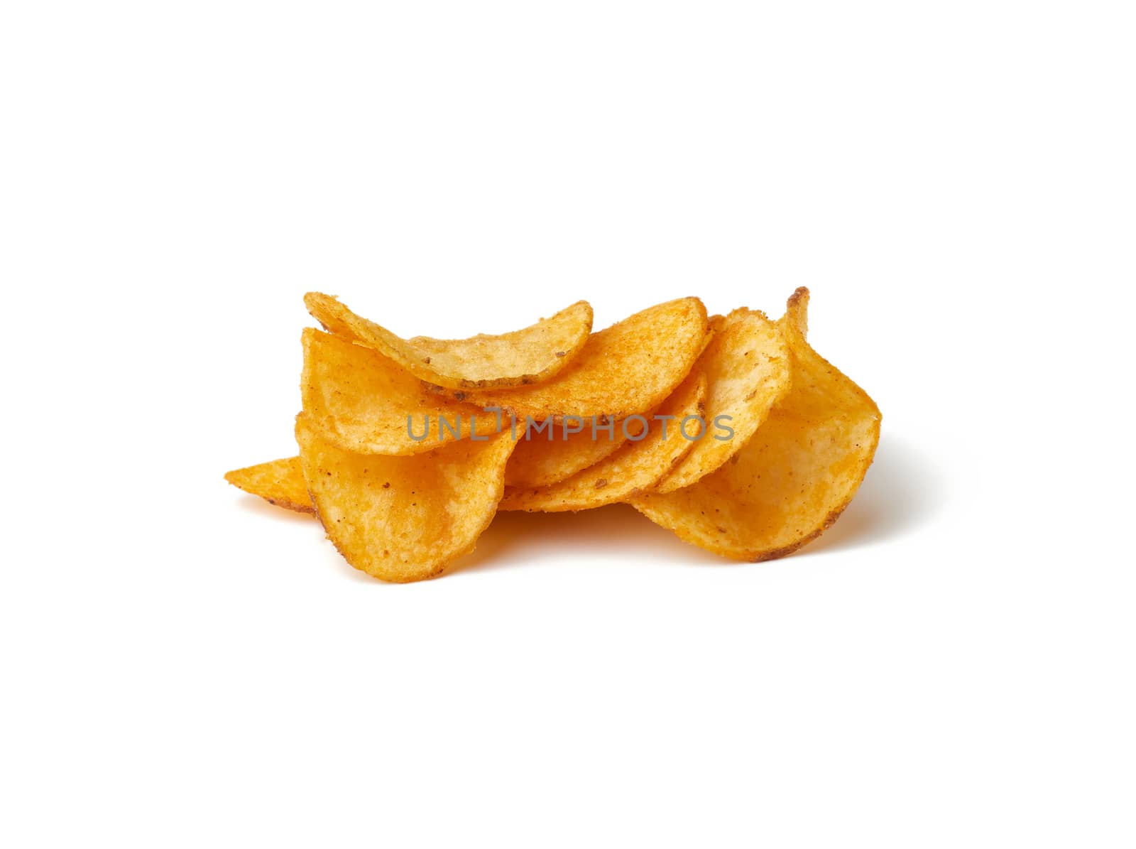 heap of potato chips with spice isolated on a white background by ndanko