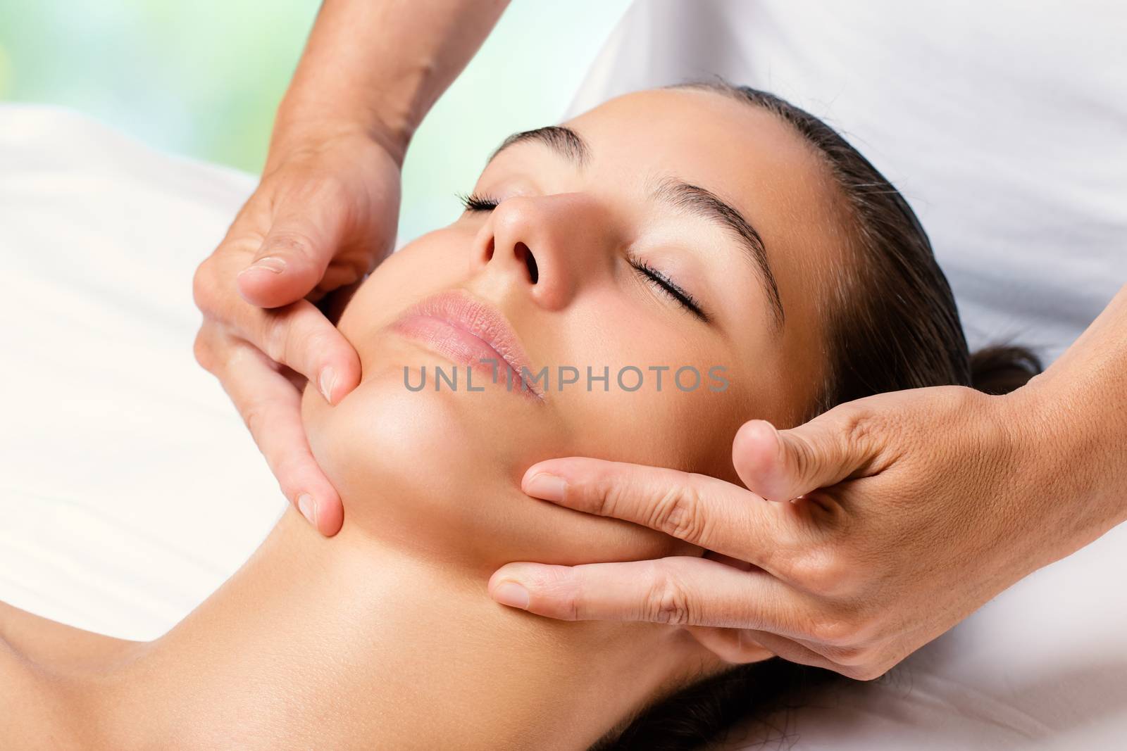 Beauty facial massage on female chin. by karelnoppe