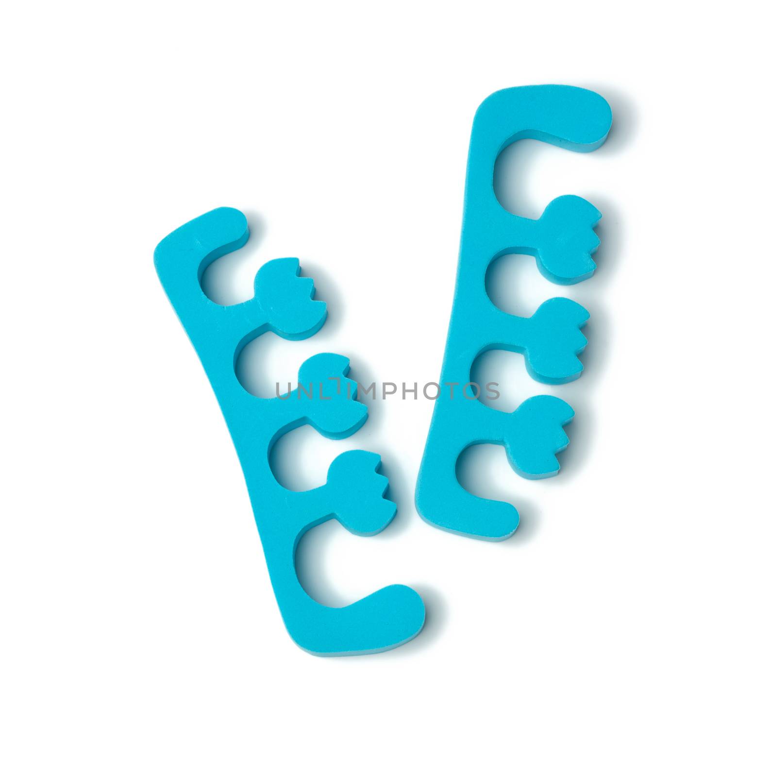 neoprene blue toe holders for pedicure isolated on white background, close up