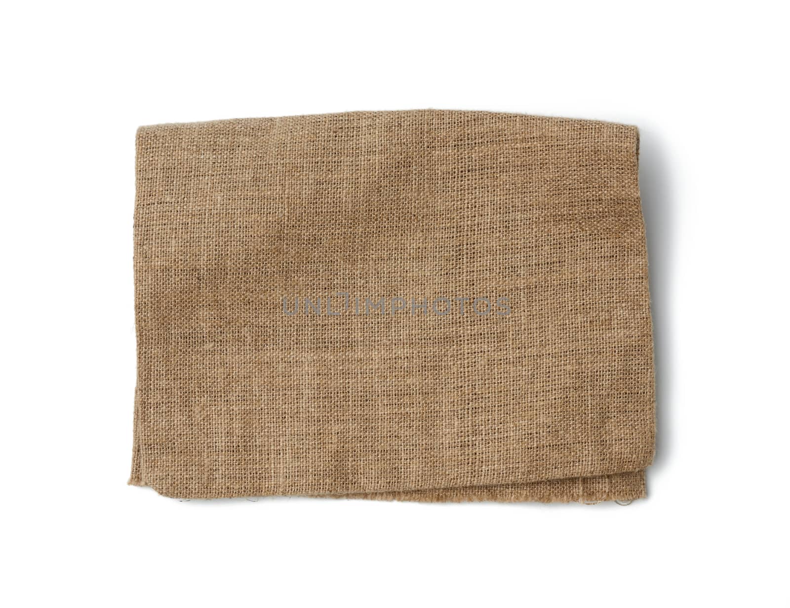brown burlap fragment isolated on white background, top view