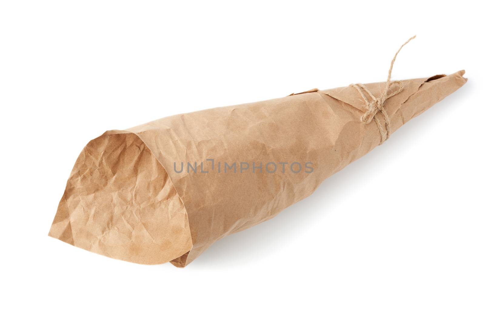 empty cone-shaped fist from brown crumpled paper isolated on whi by ndanko