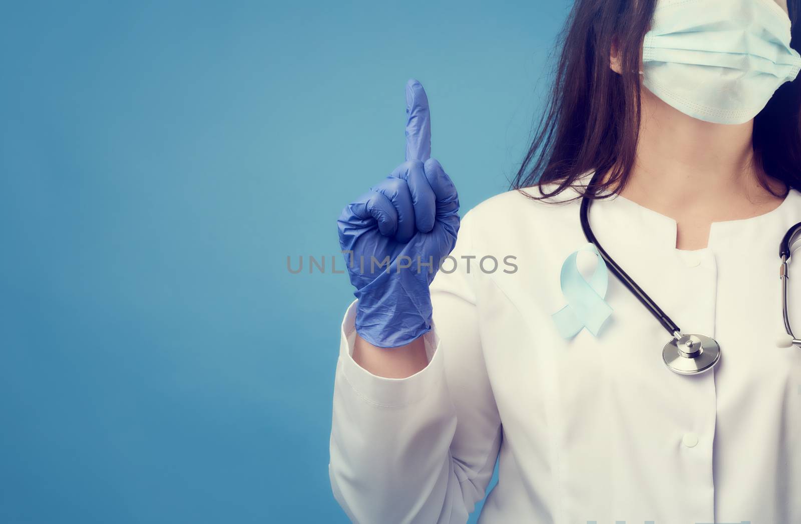 female doctor in a disposable sterile mask and a white coat stan by ndanko