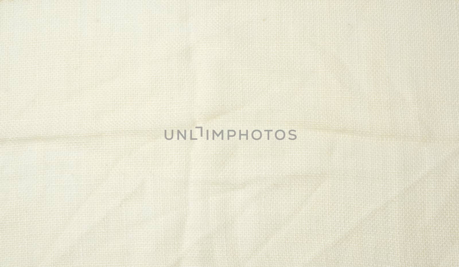crumpled beige synthetic fabric for the manufacture of lining for skirts, full frame
