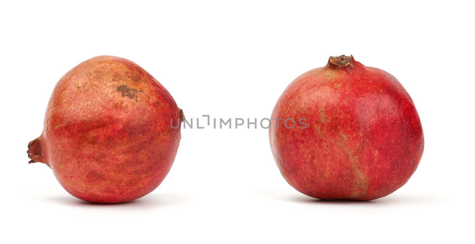 round red ripe pomegranate fruit in peel isolated on a white background, close up, set