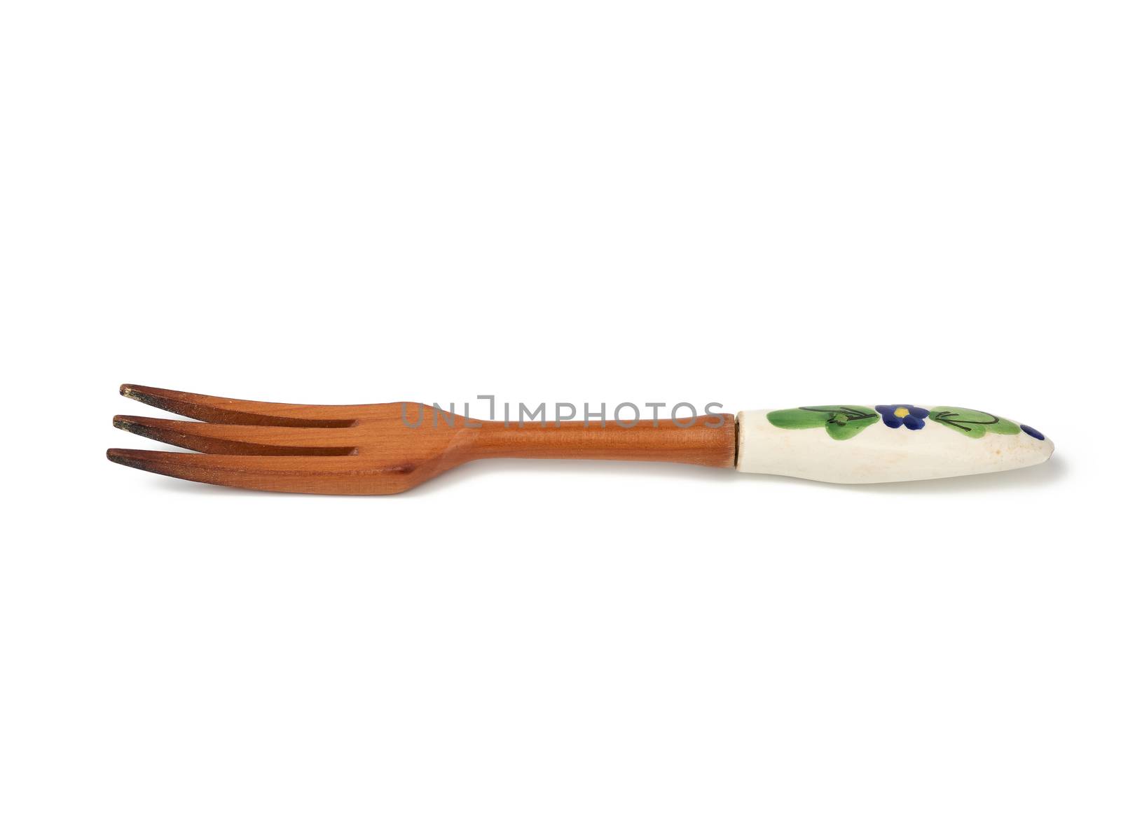wooden vintage fork with ceramic handle isolated on a white background, kitchen utensils