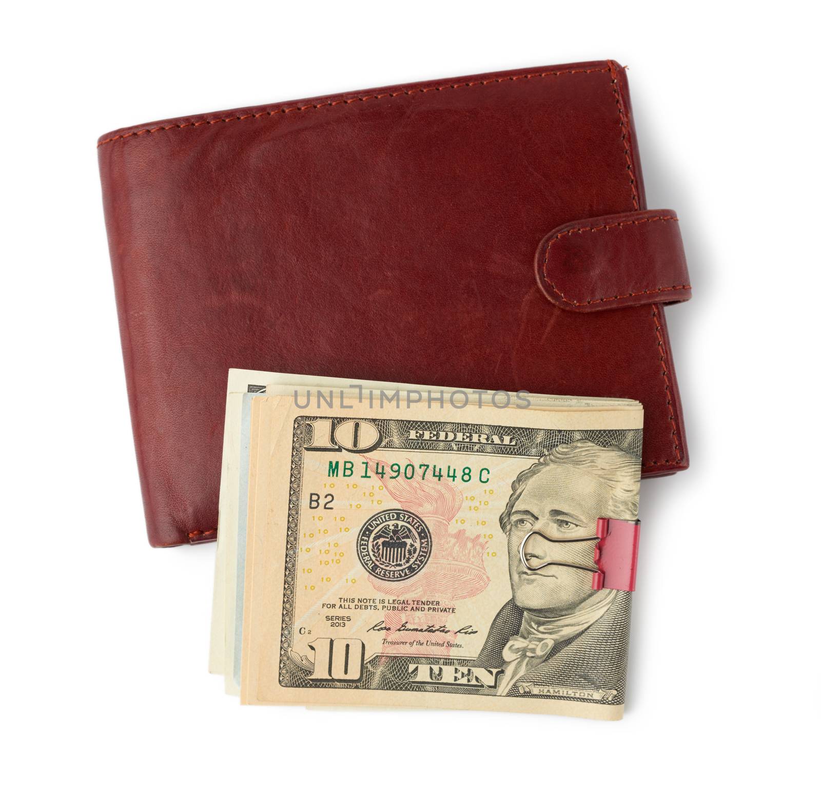 closed brown leather wallet with US dollar bills isolated on white background, wealth concept