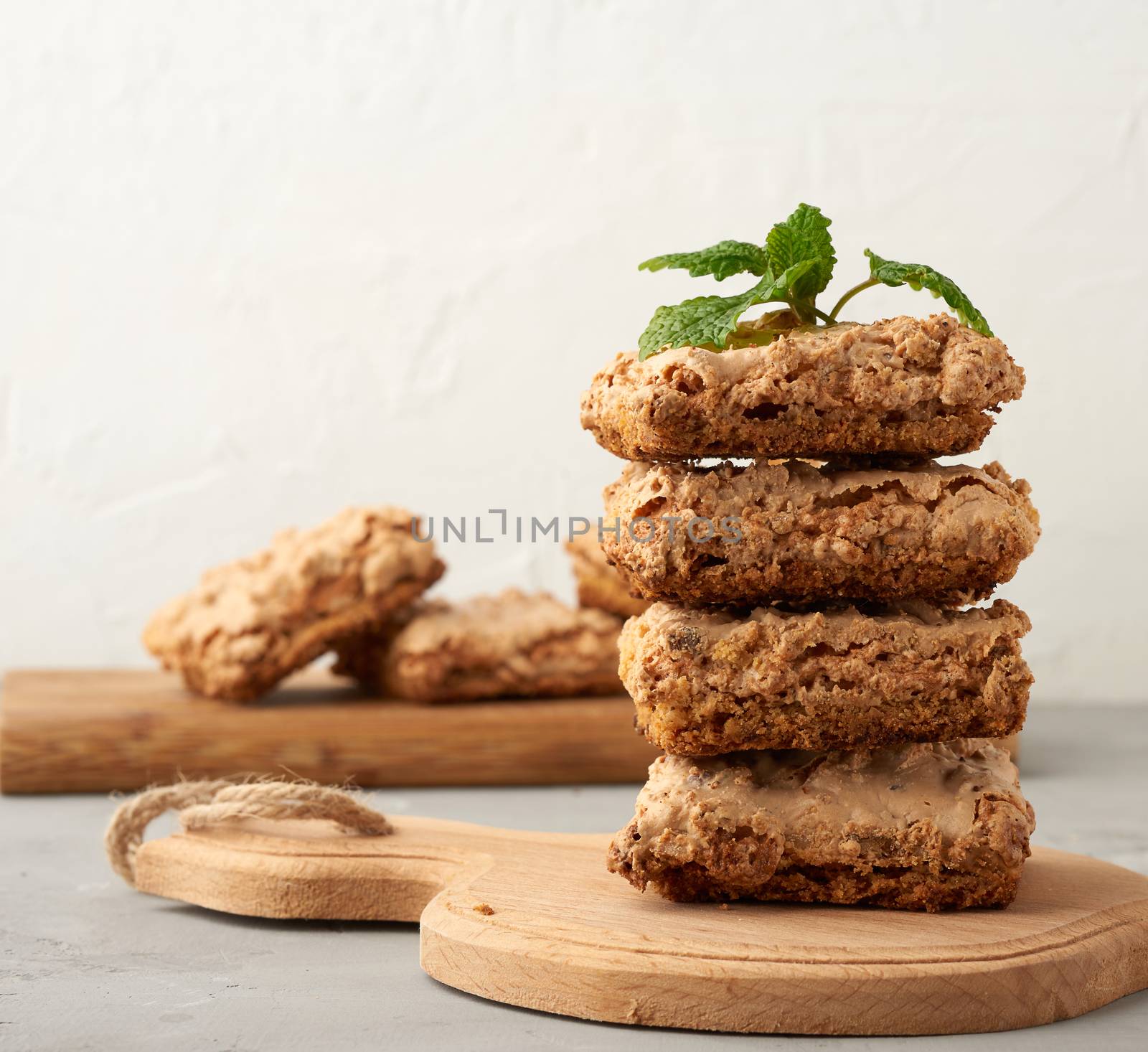 baked Krakow meringue cookies on a wooden board, delicious dessert of whipped egg whites and almond flour