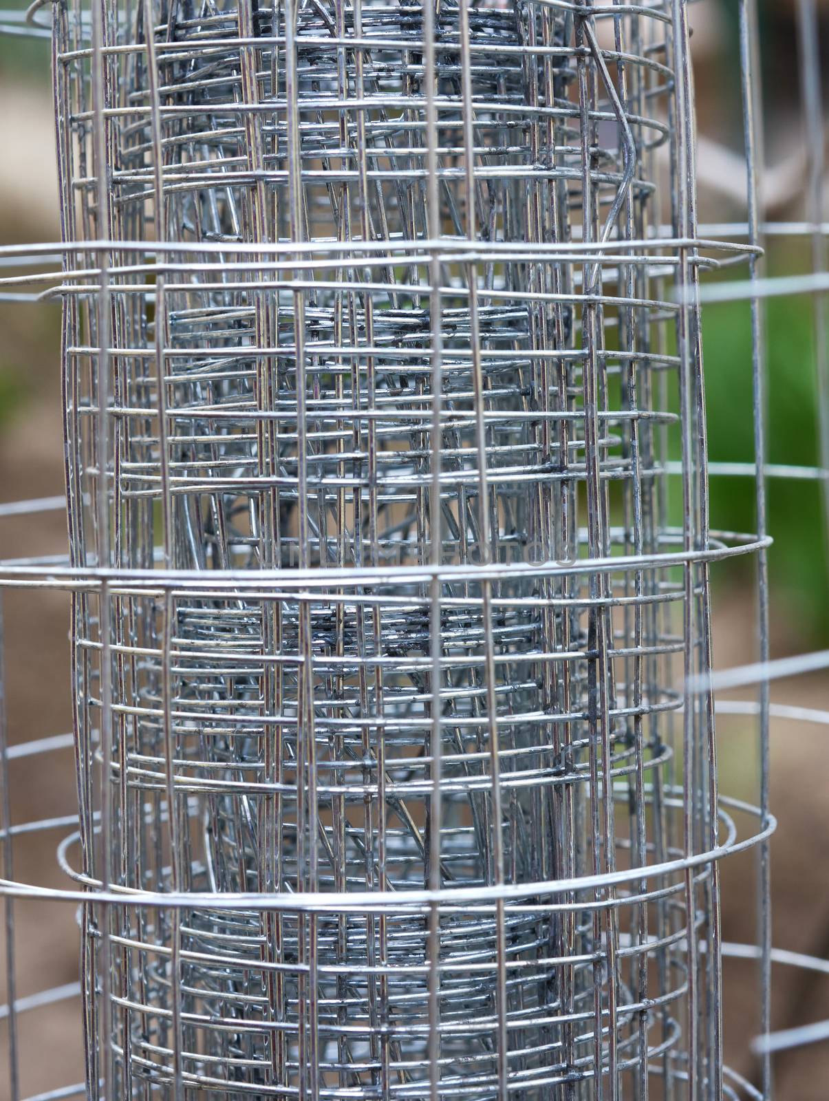 twisted metal fence made of wire, close up