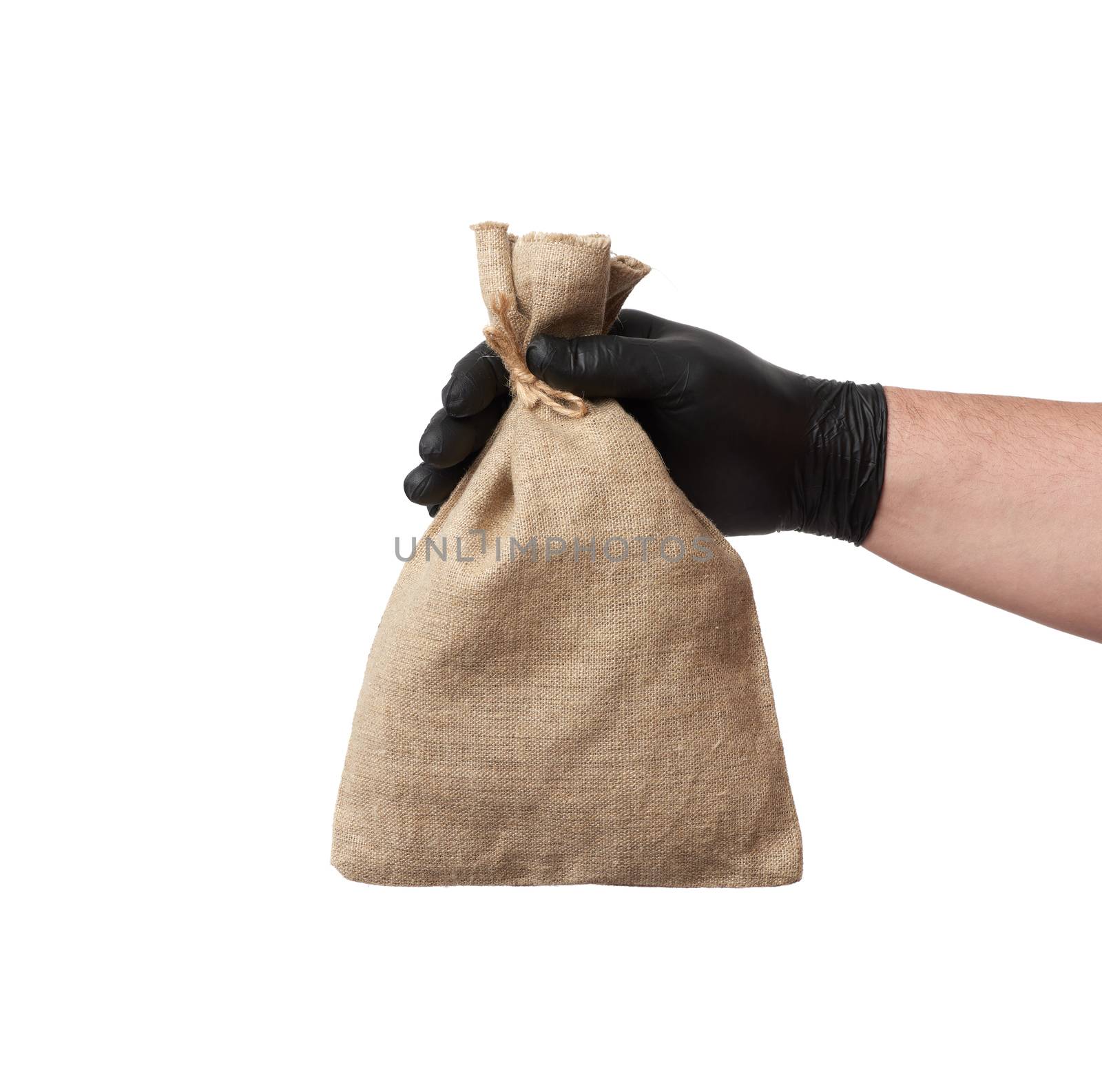 male hand in black latex glove holds a full canvas bag on a white background, close up