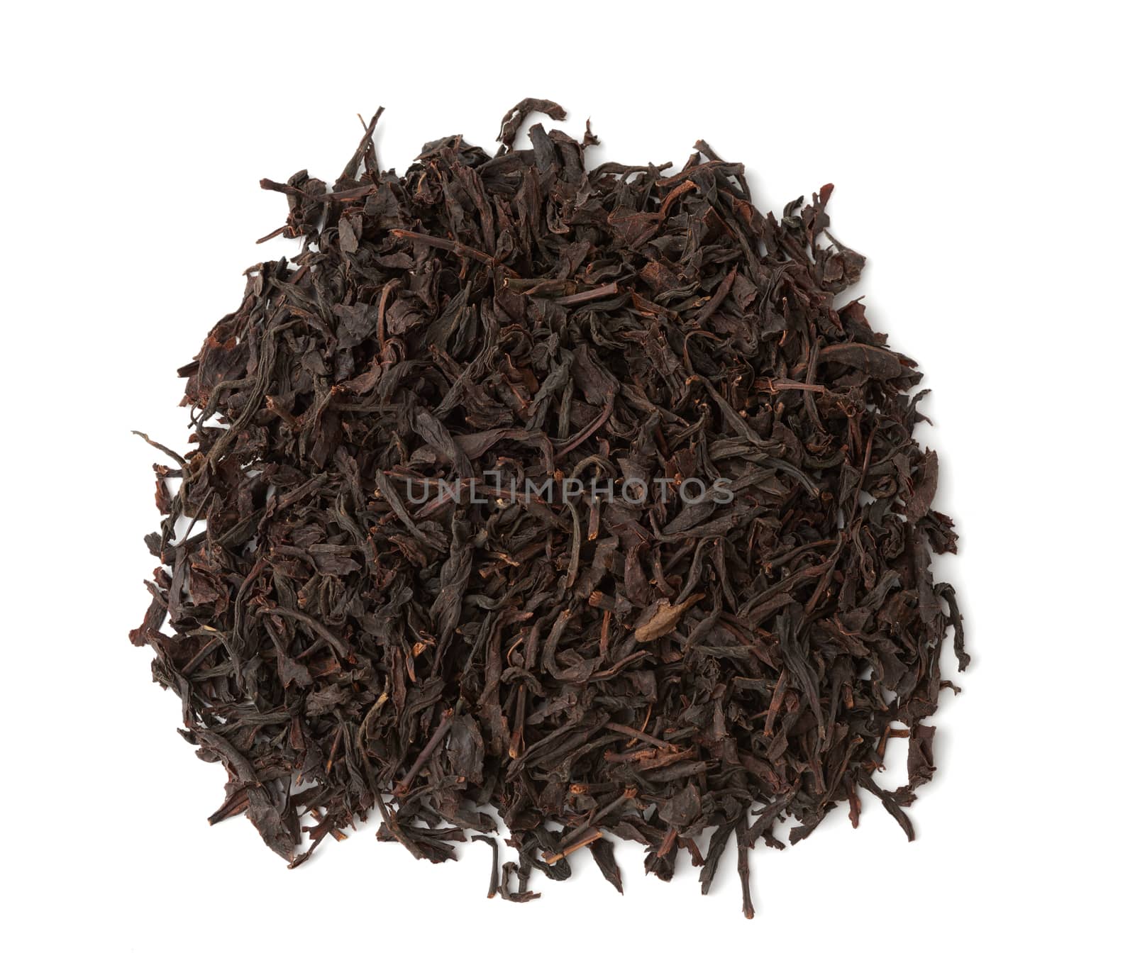 dry black long leaf tea, top view, ingredients for a hot drink, close up