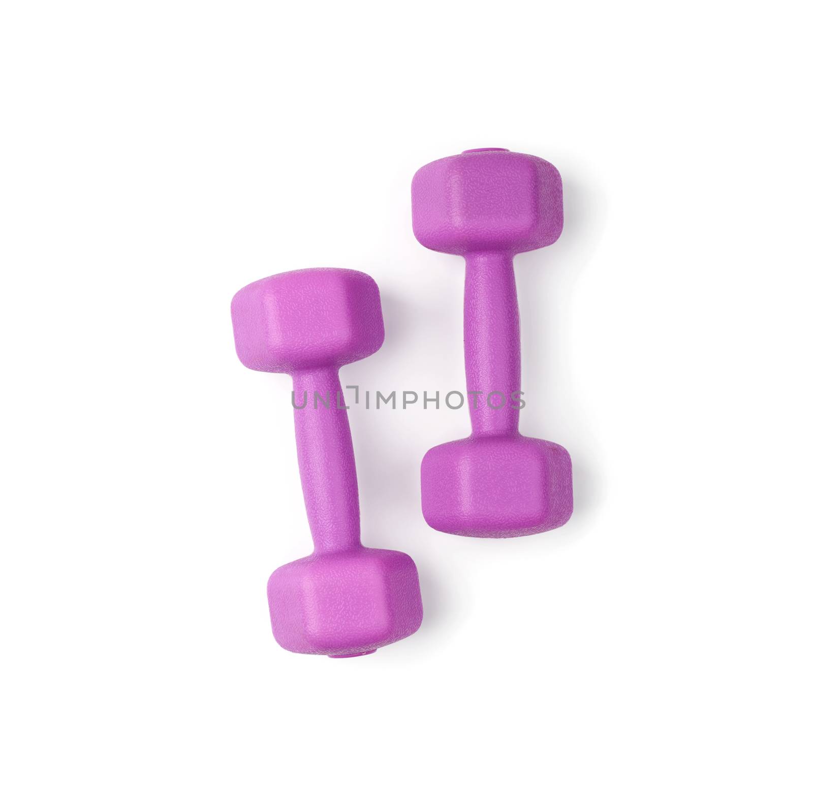 purple plastic dumbbell for sports isolated on white background, close up. Weightlifting equipment. Fitness training. Healthy lifestyle
