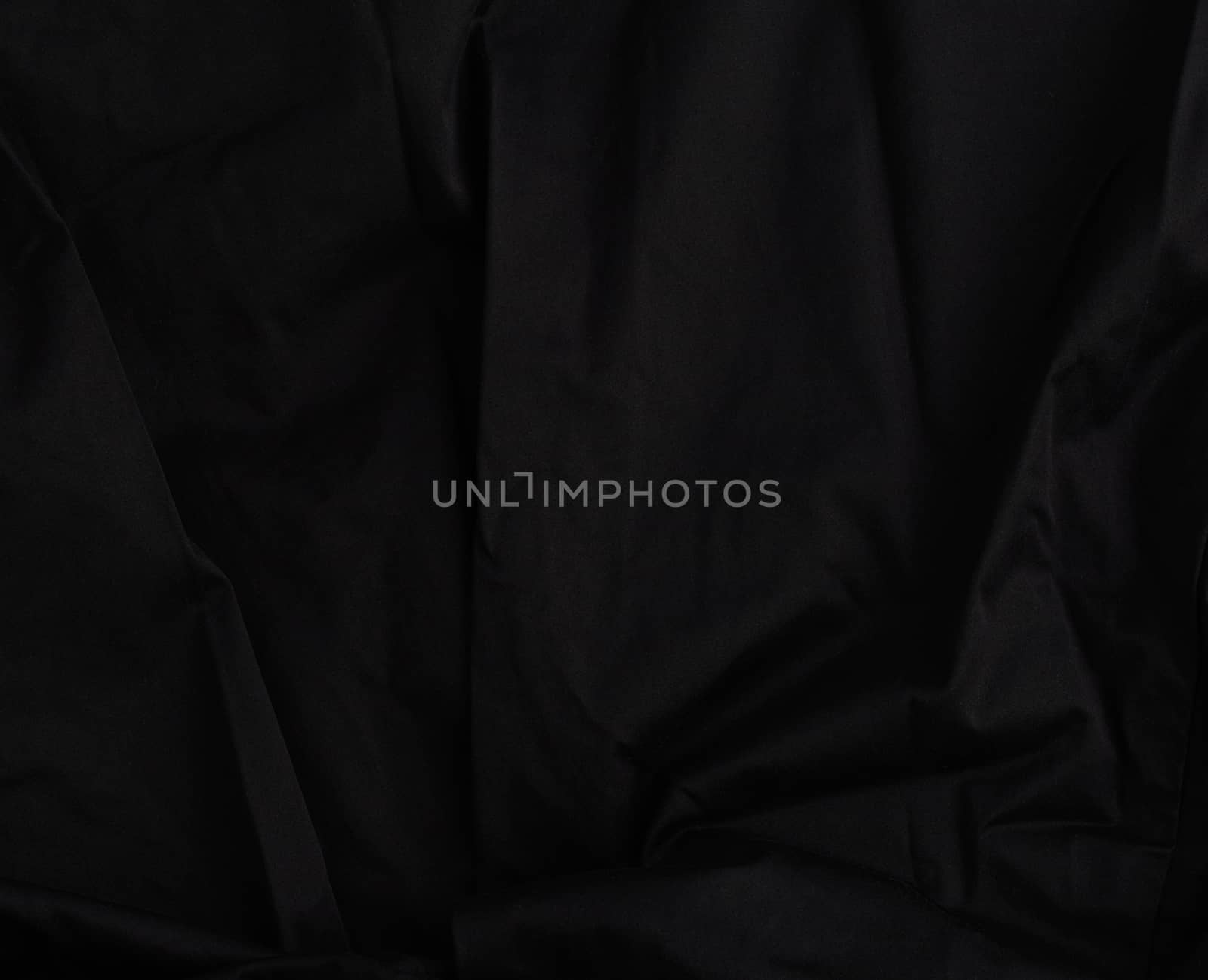 texture of black cotton fabric with waves, full frame, fabric for sewing clothes, shirts. Design Element