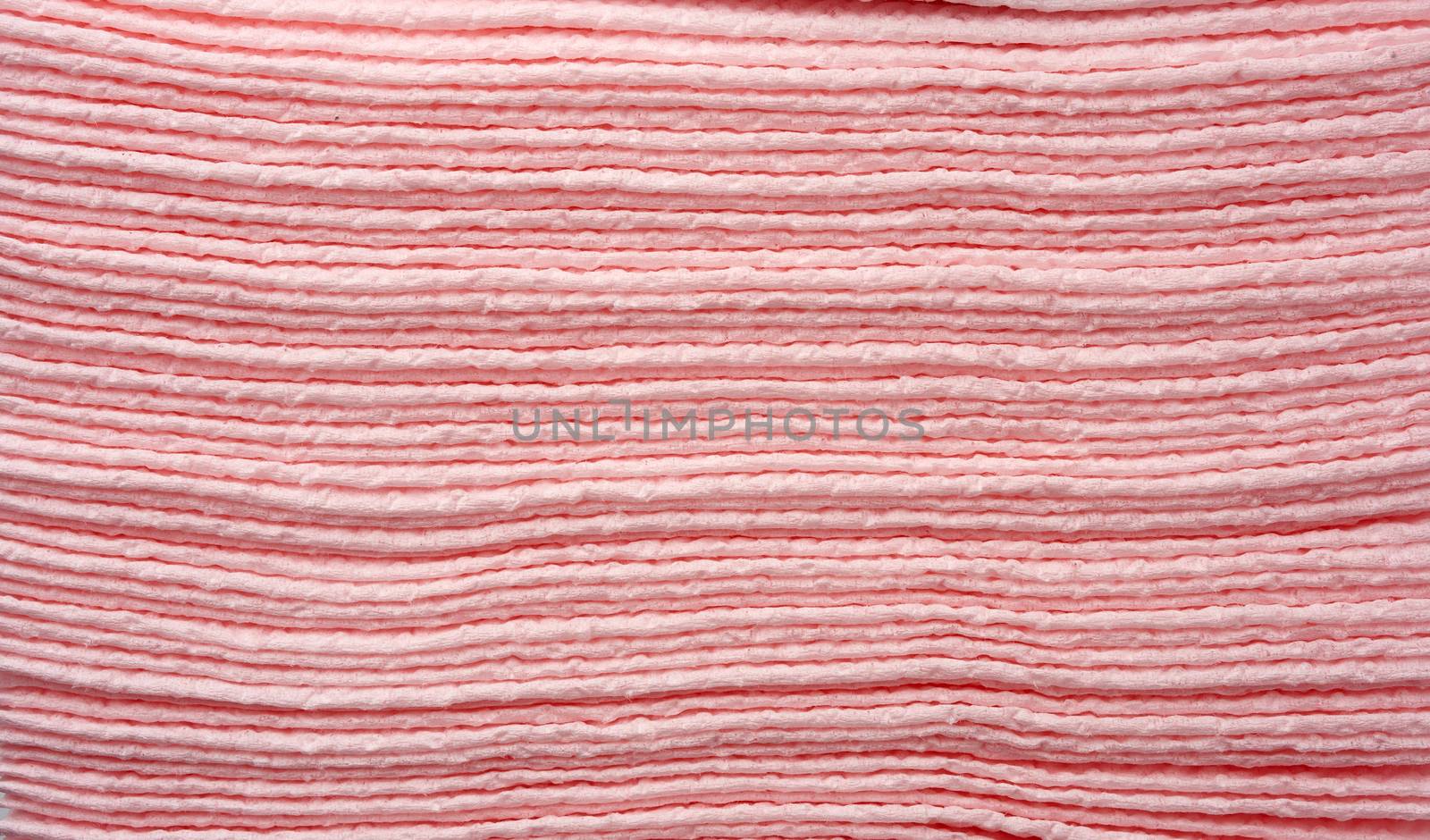 texture of pink paper napkins, full frame, close up