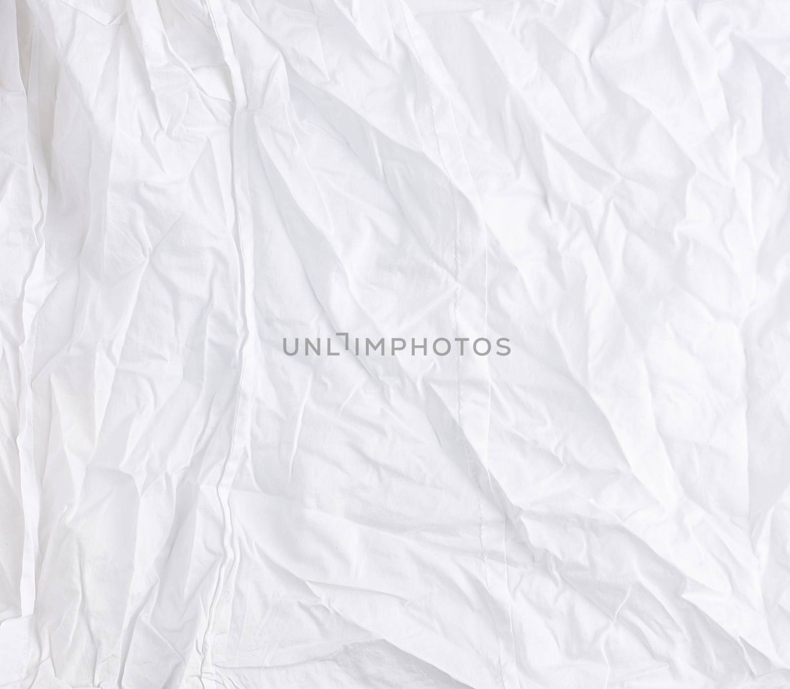 crumpled white cotton fabric, fabric for sewing clothes and shirts, full frame
