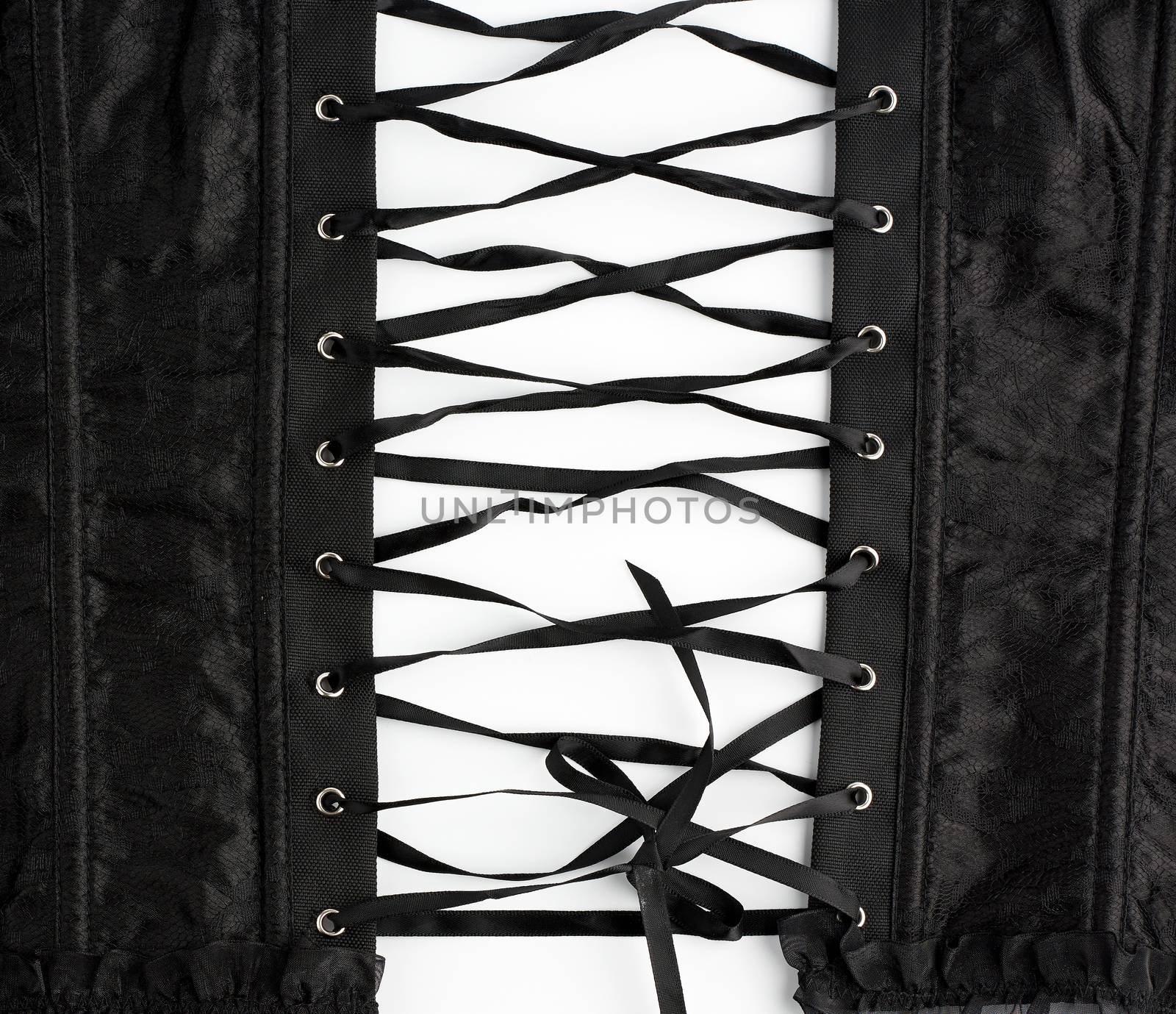 fragment of a black satin corset with lacing, back view, clothing item on a white background
