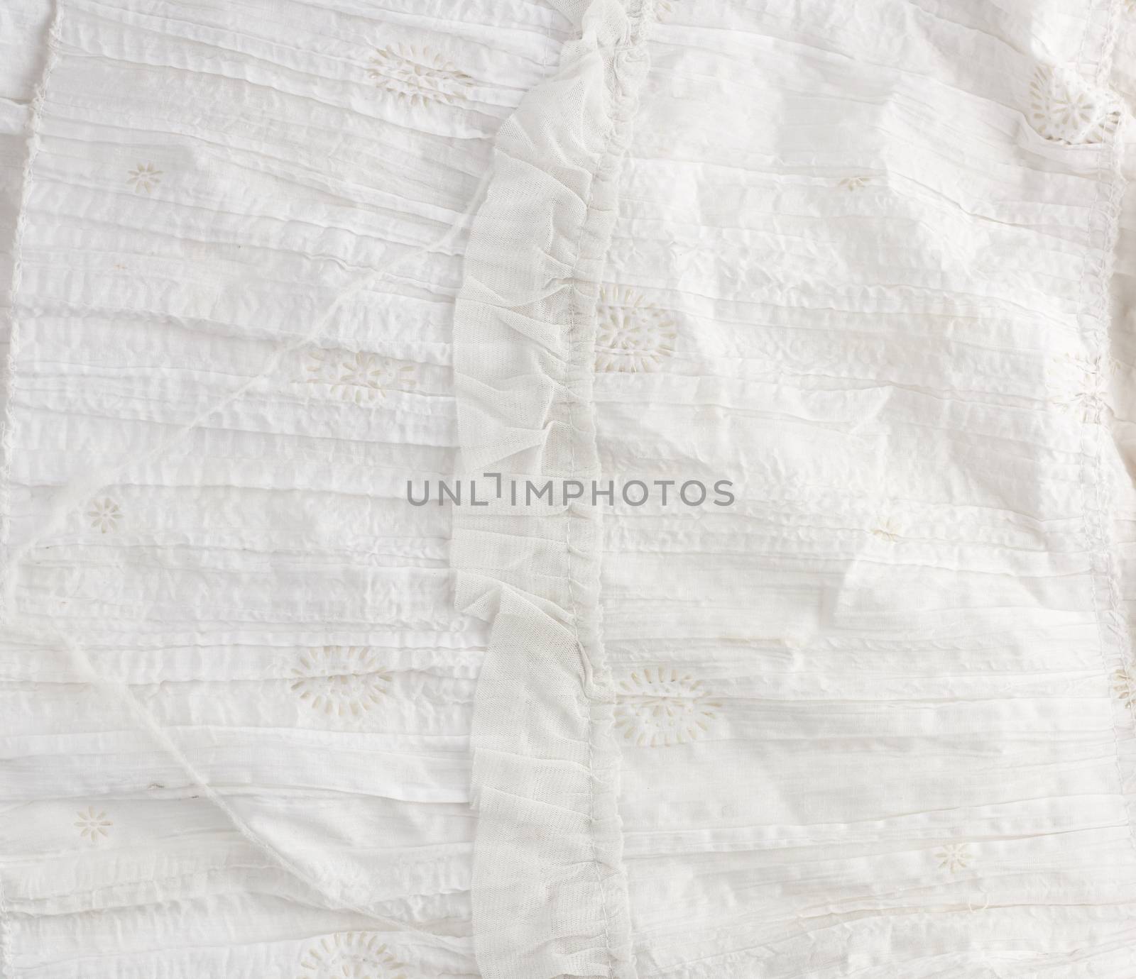 crumpled white cotton fabric, fabric for sewing clothes and shirts, full frame