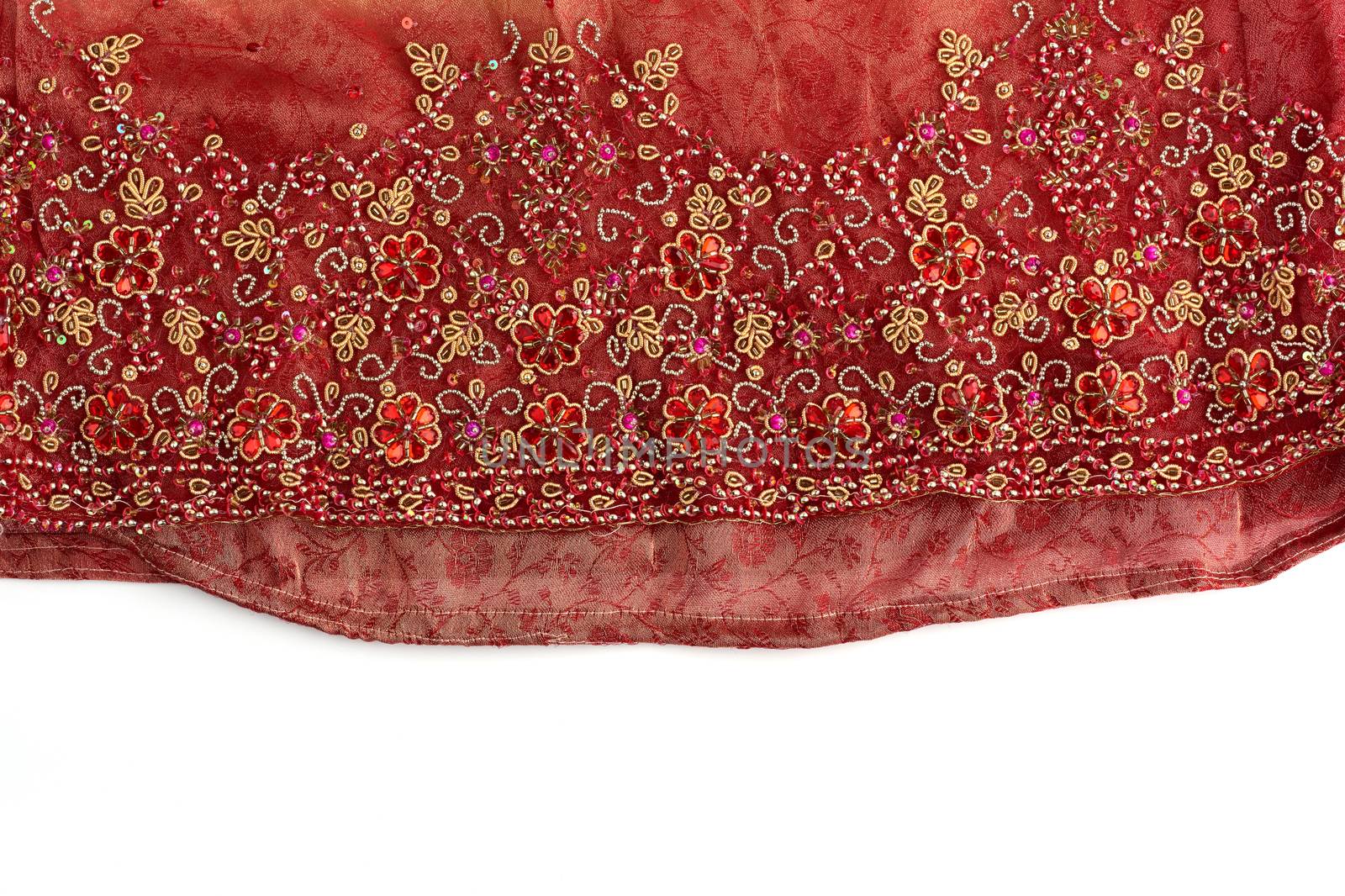 red tulle with sewn red round sequins and embroidered bead pattern, fabric for sewing clothes, full frame. skirt bottom