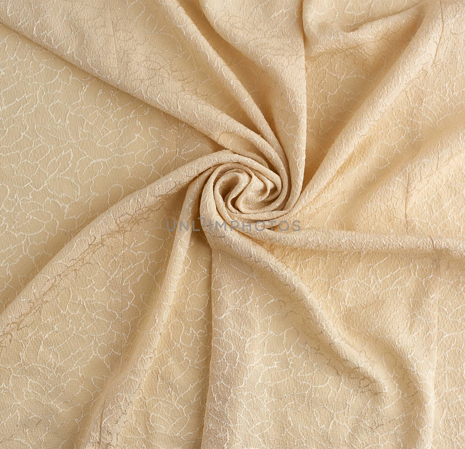 beige satin textile fabric with embroidery elements, piece of canvas for sewing curtains and things, full frame. Crumpled textile satin, great design for any purposes.