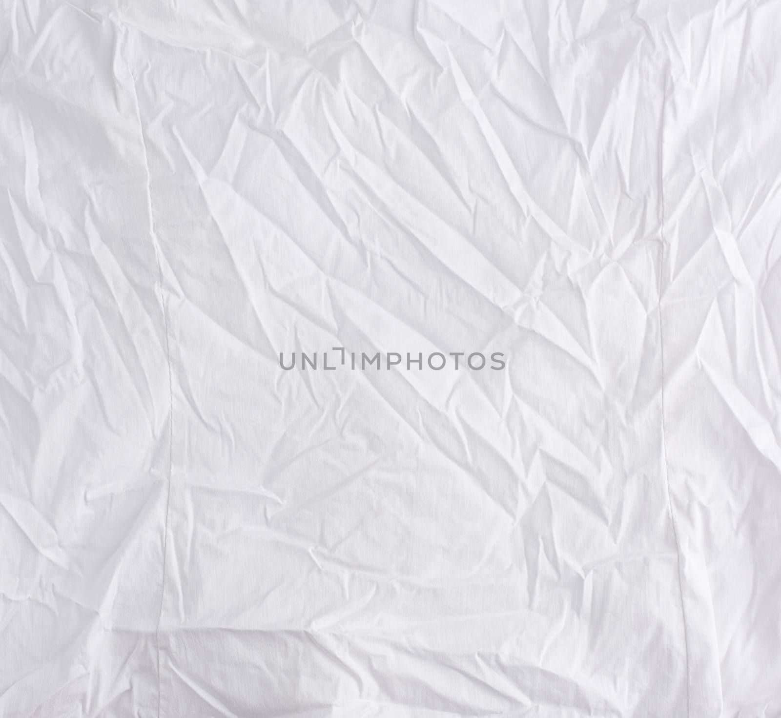 crumpled white cotton fabric, fabric for sewing clothes and shirts, full frame