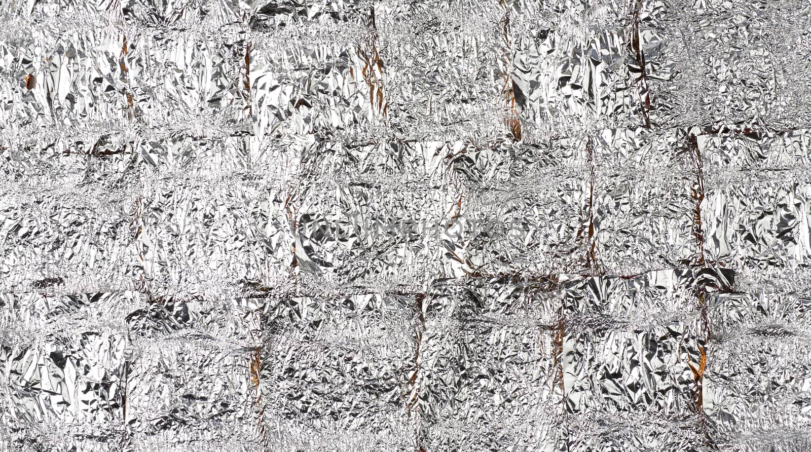 crumpled candy wrappers texture, foil, close up