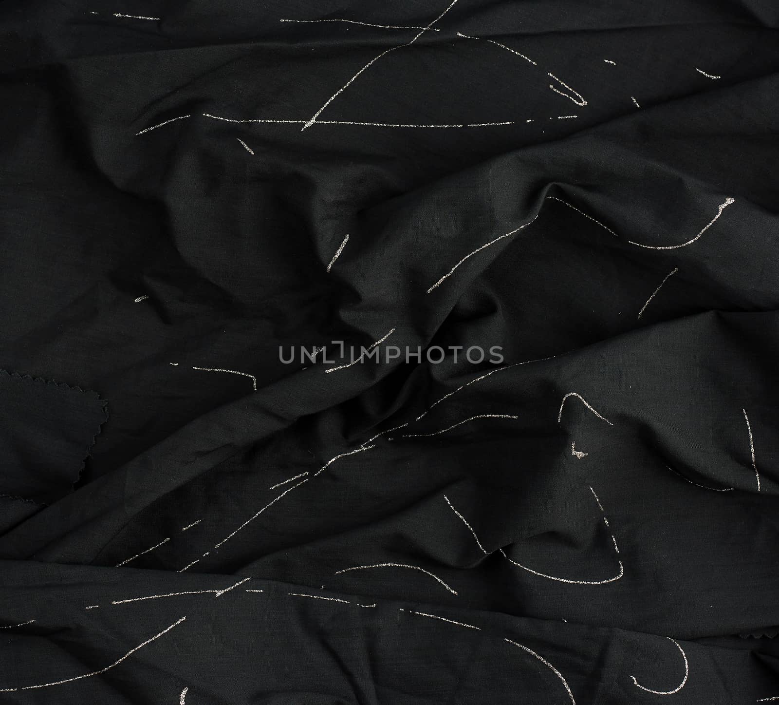 texture of black cotton fabric with waves, full frame, fabric for sewing clothes, shirts. Design Element