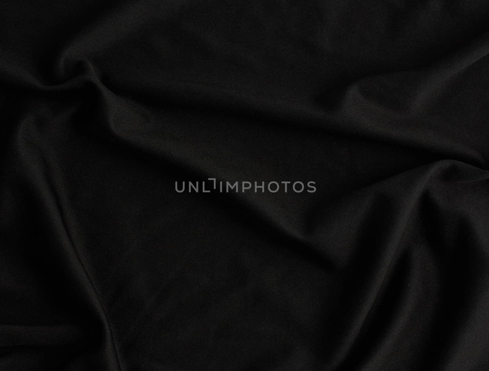 texture of black cotton fabric with waves, full frame, fabric for sewing clothes, shirts. Design Element
