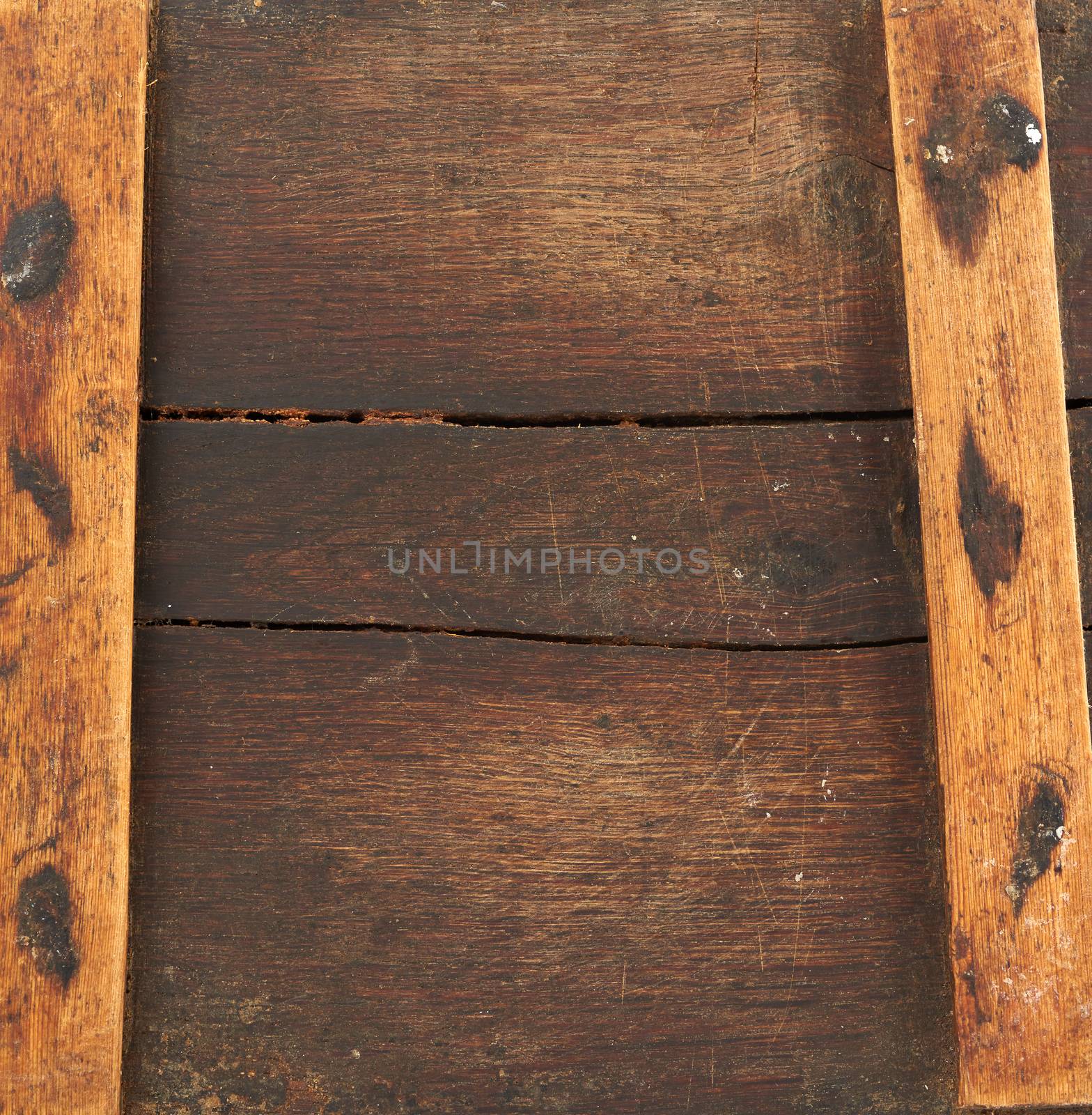 texture of a very old brown wood, full frame, backdrop for the designer, close up