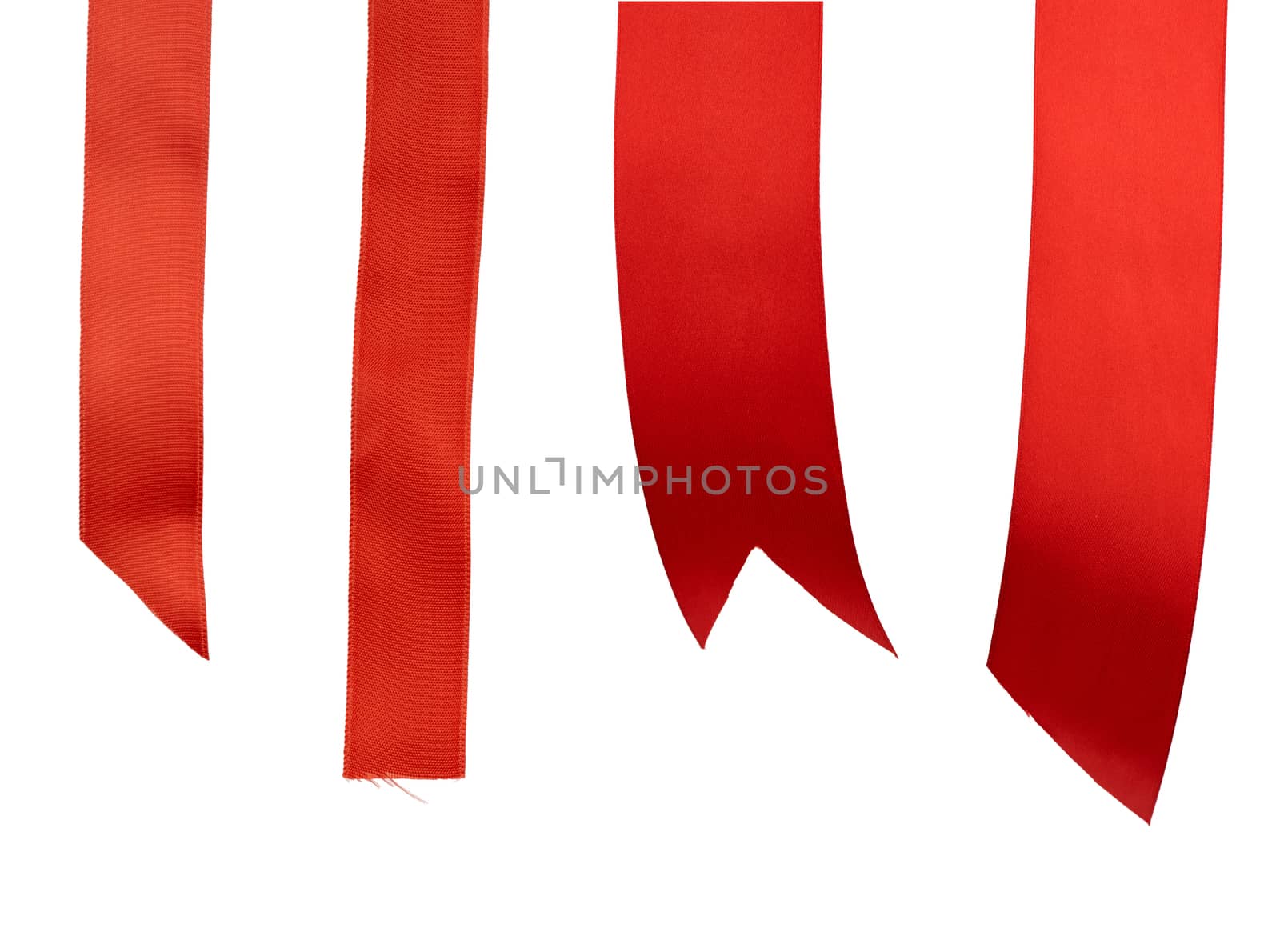 different ends of red silk ribbon isolated on white background, close up