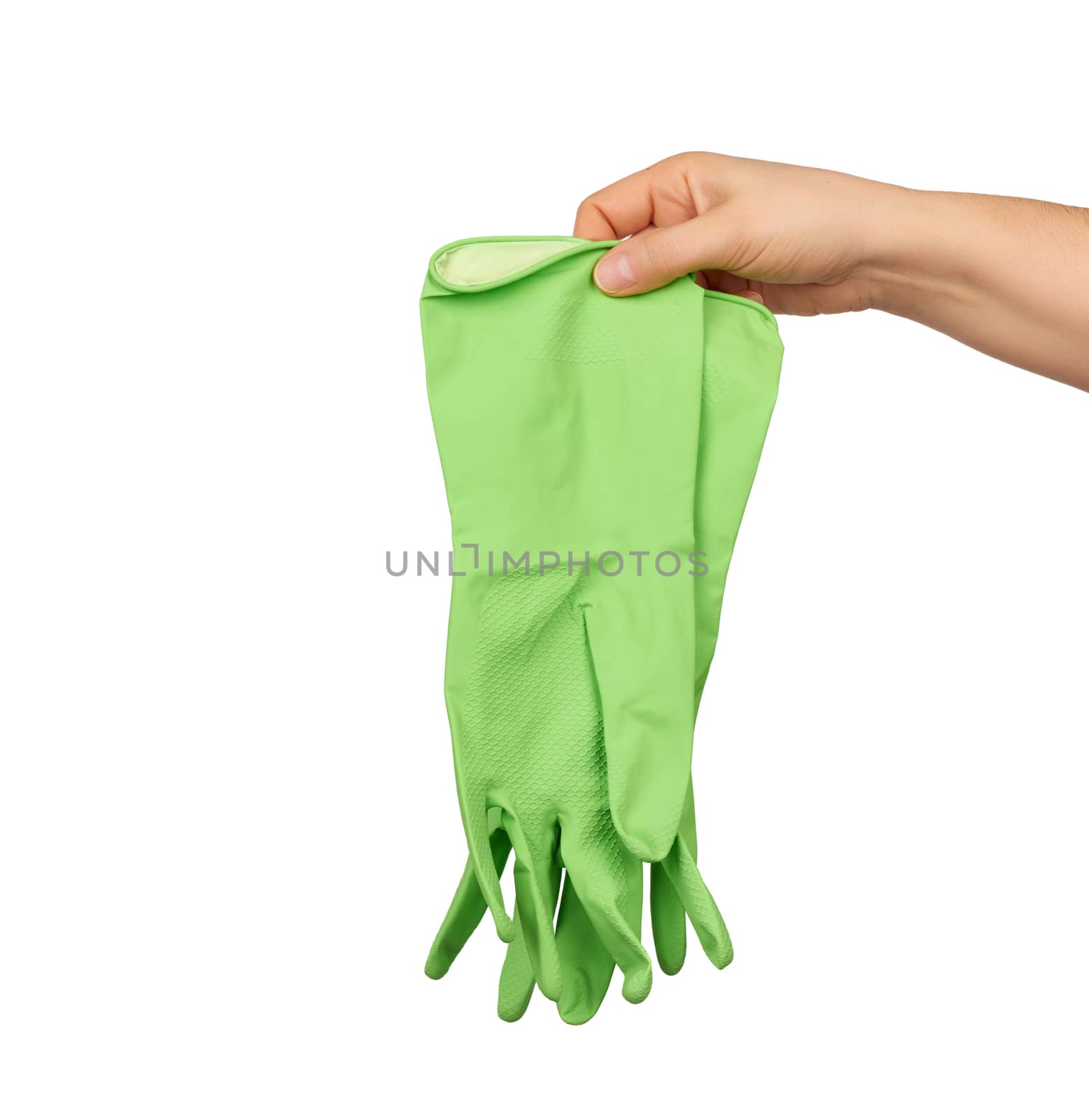female hand holds green rubber gloves for cleaning, white background