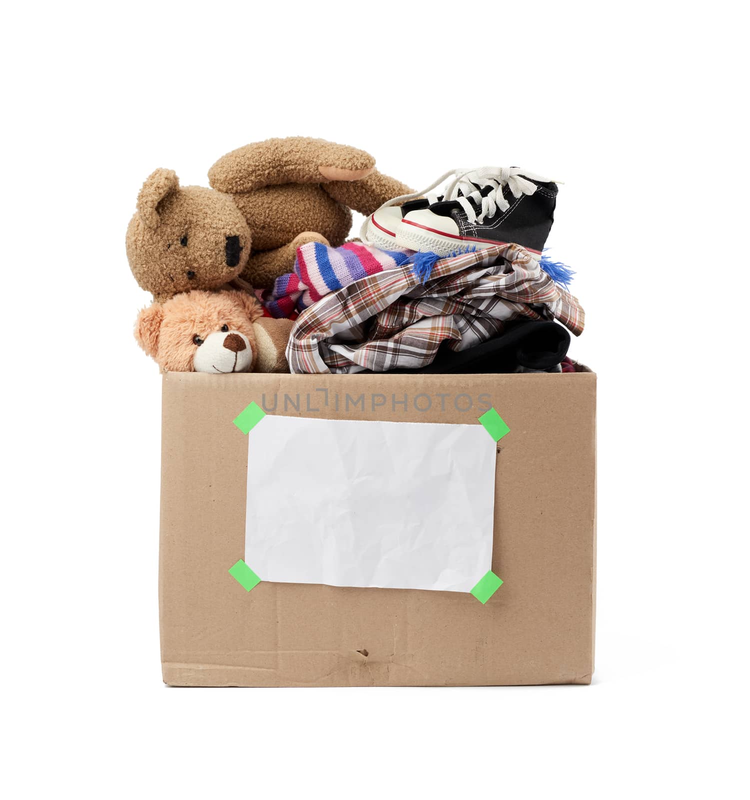 brown cardboard box with things, toys isolated on white background, concept of moving, volunteering and help