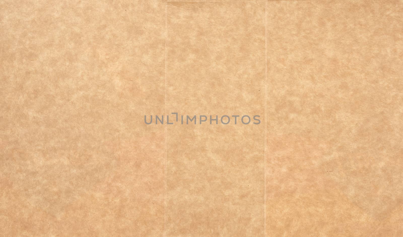 piece of smooth brown cardboard paper, full frame, close up