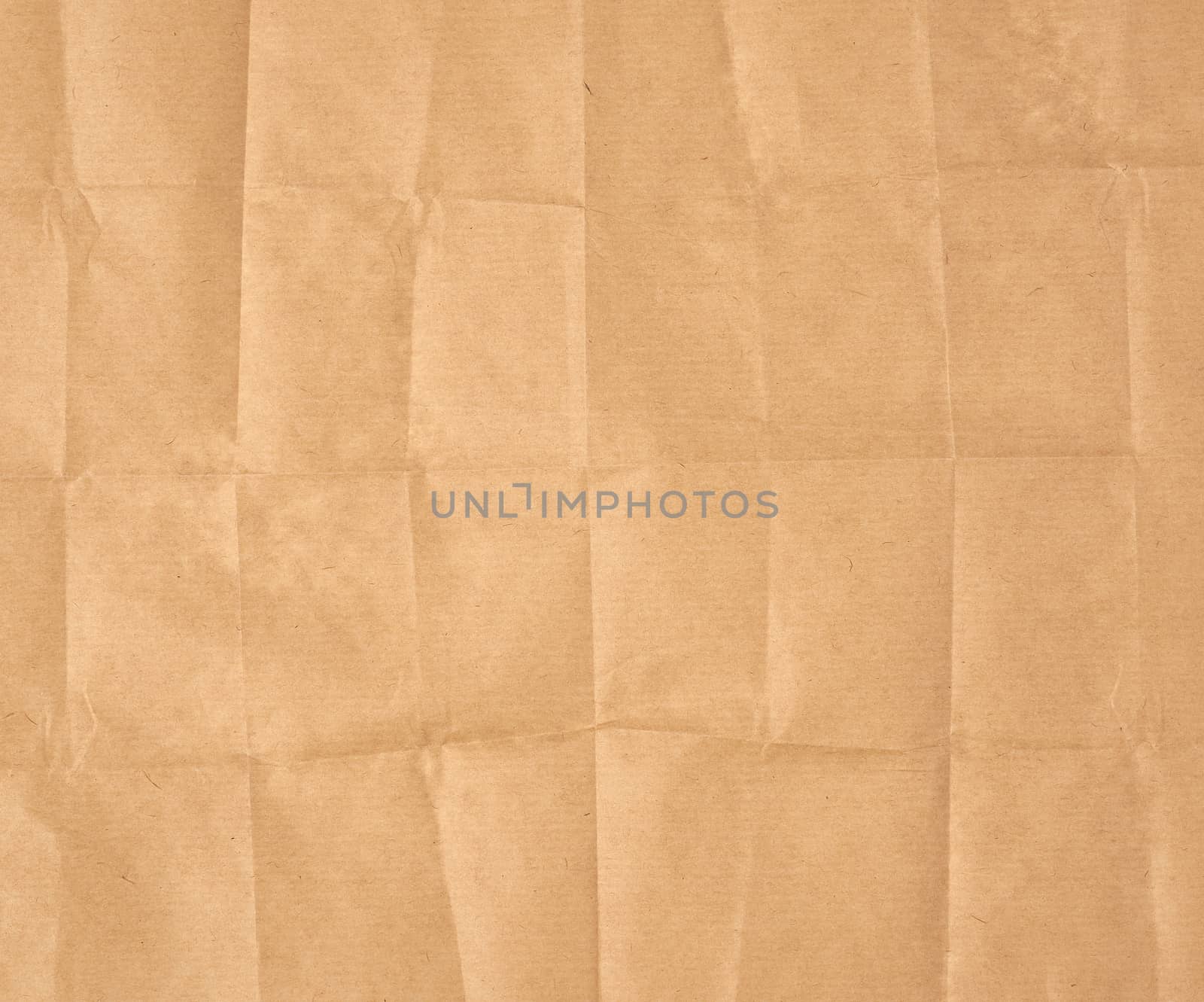 crumpled blank sheet of brown wrapping kraft paper, vintage texture for the designer, full frame