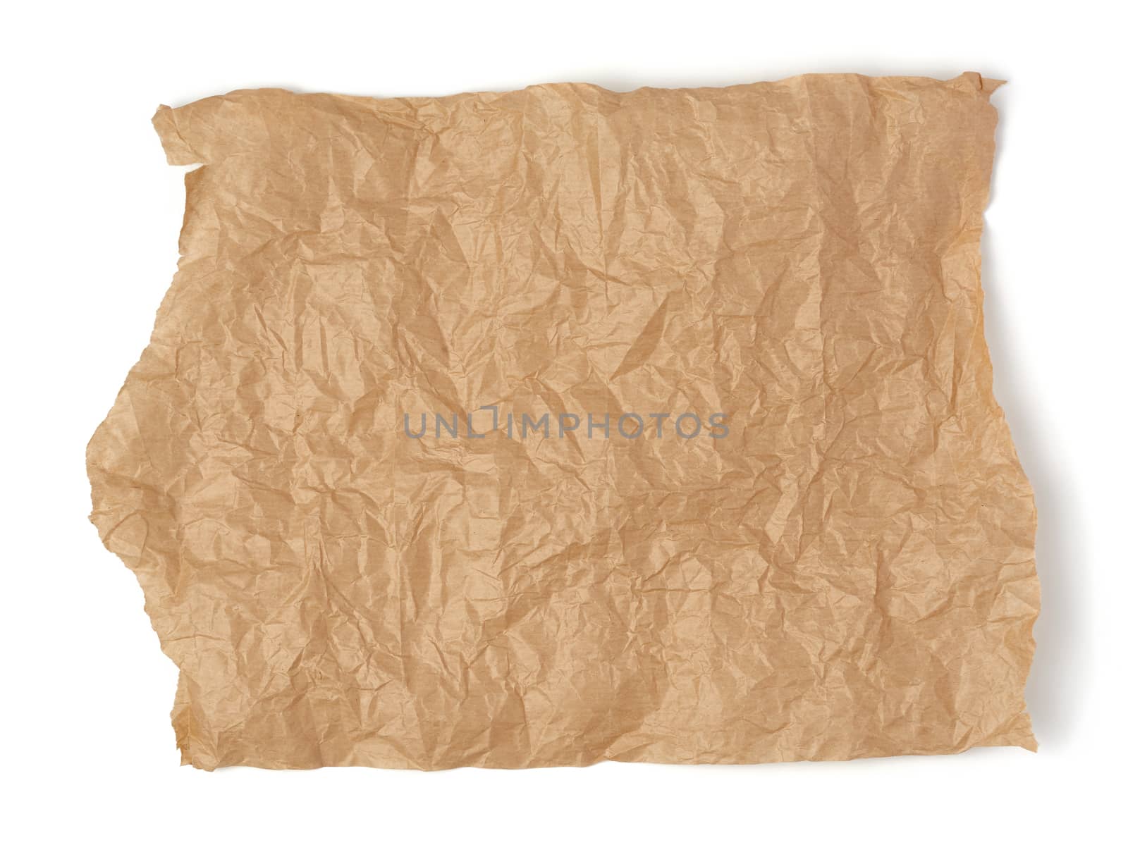 piece of crumpled brown paper isolated on white background, element for designer
