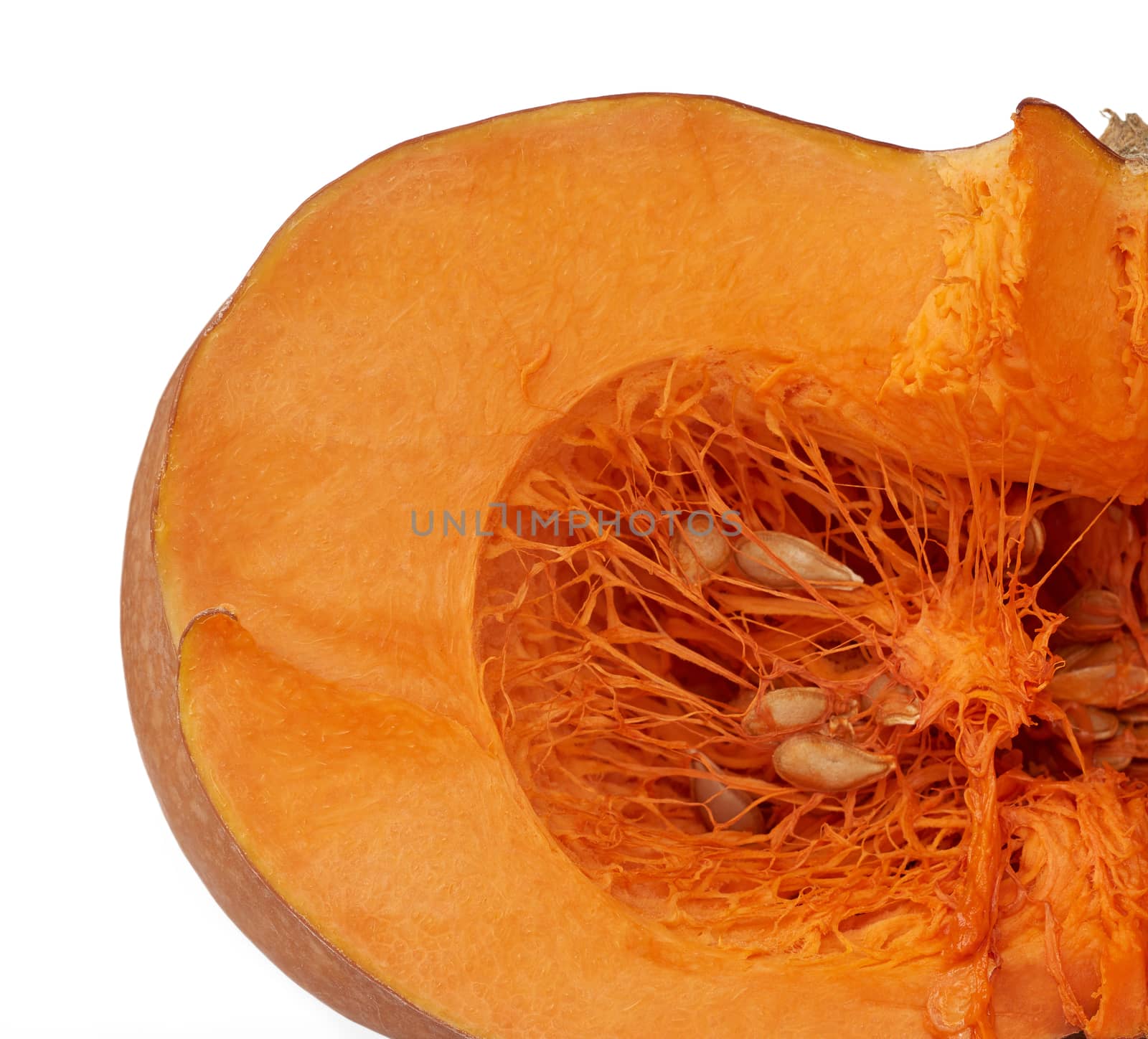 halved big orange pumpkin with seeds isolated on a white background, autumn harvest