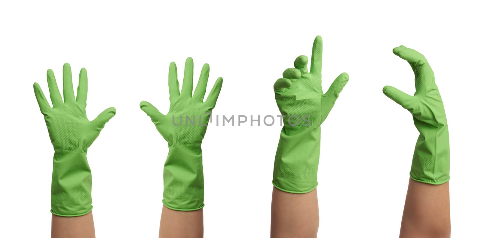 green rubber glove for cleaning is dressed on the hand, palm is open and conditionally holds the item, set