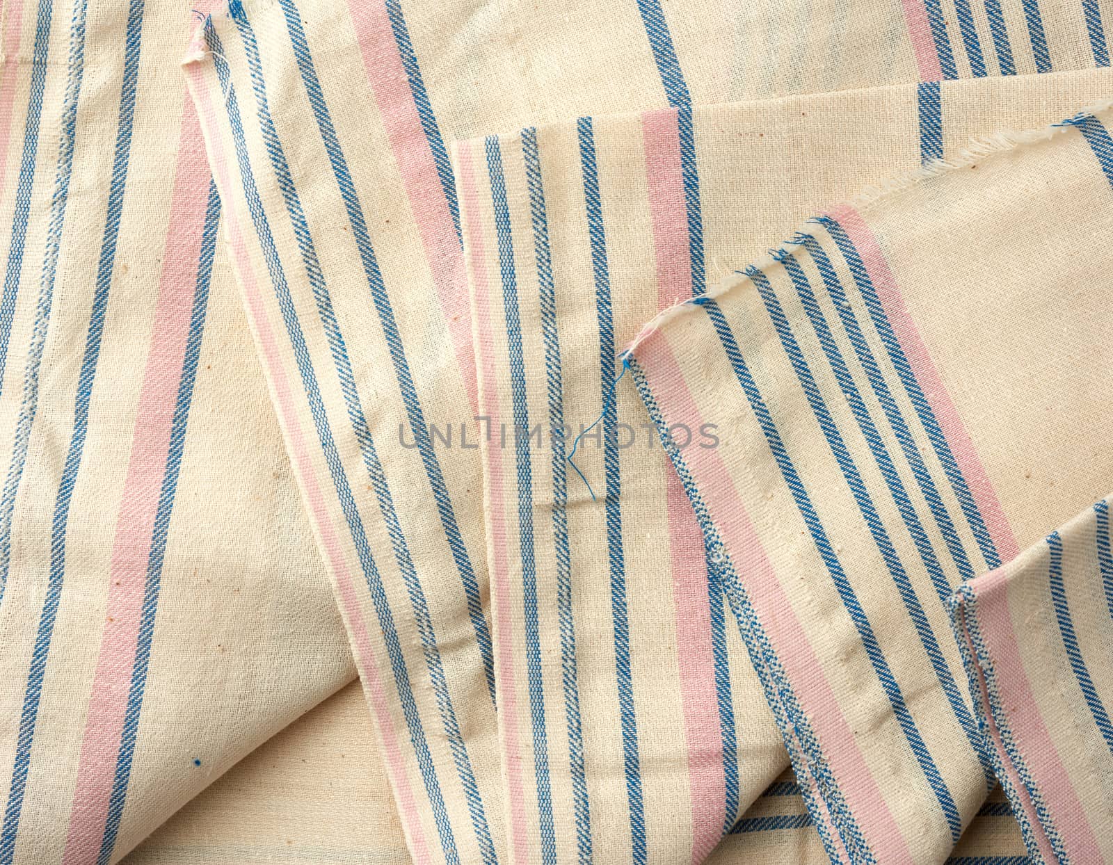 white vintage striped cotton fabric, folded canvas, close up