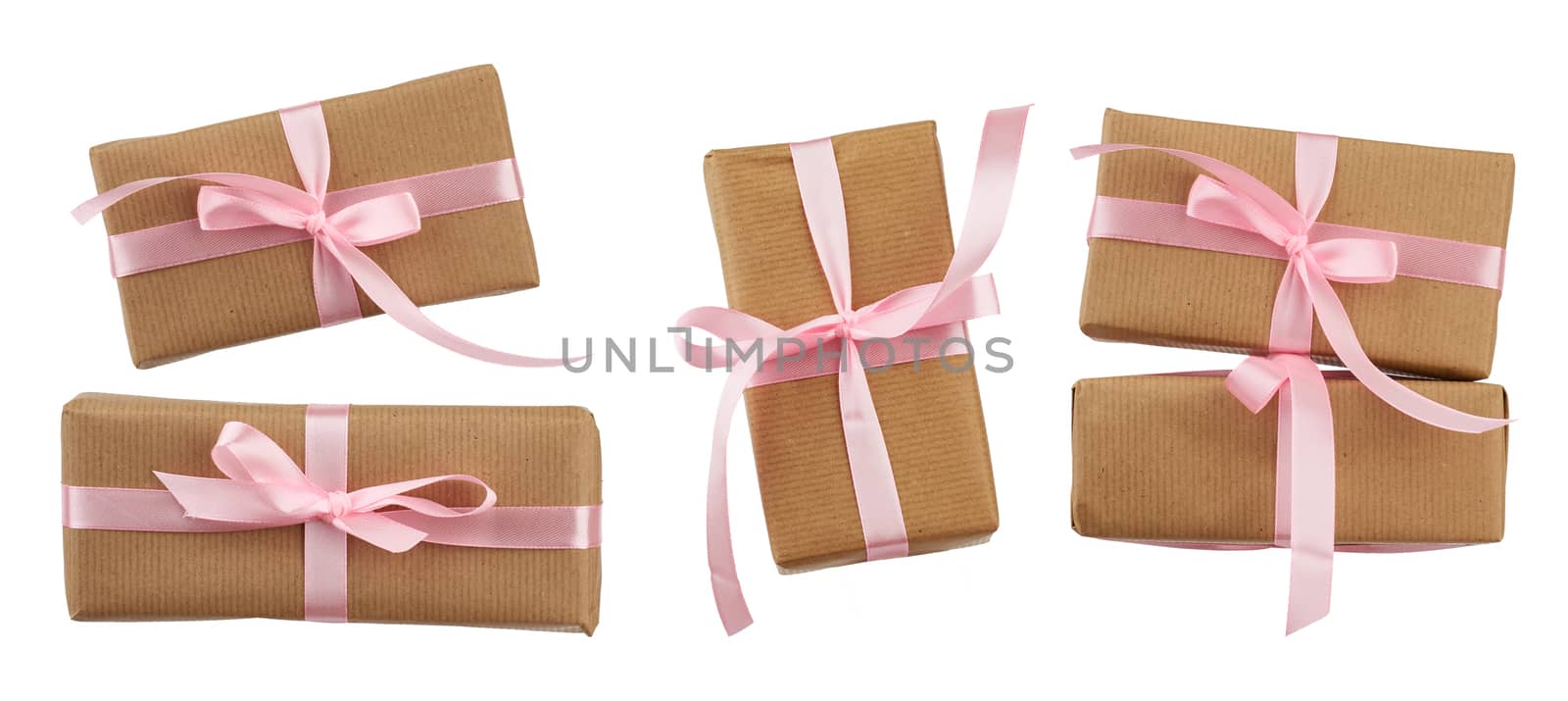 set of rectangular boxes wrapped in brown kraft paper and tied w by ndanko