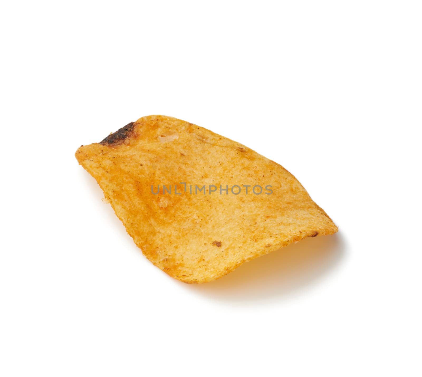 large orange fried potato chips with paprika isolated on a white background, close up