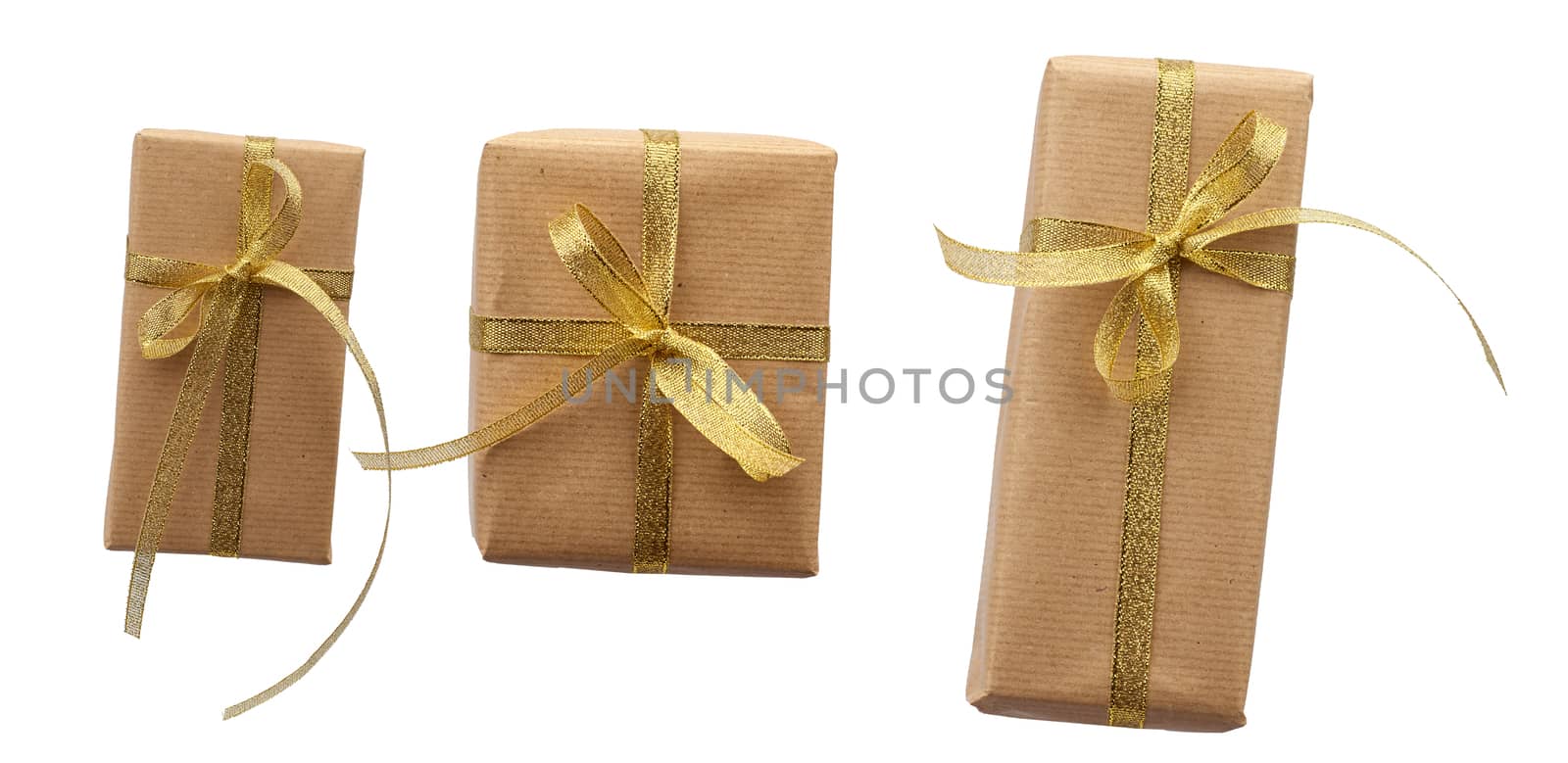 rectangle box wrapped in brown kraft paper and tied with a silk golden ribbon, gift isolated on a white background, set
