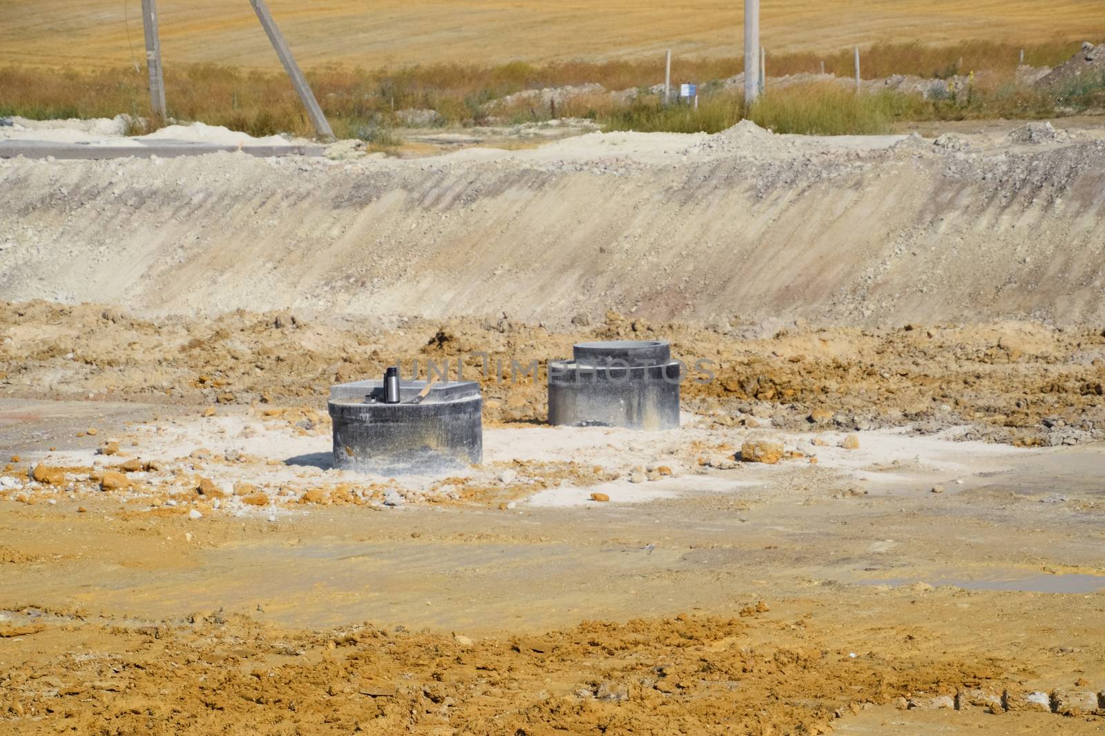 a Construction of sewer hatches. Sewer installation.