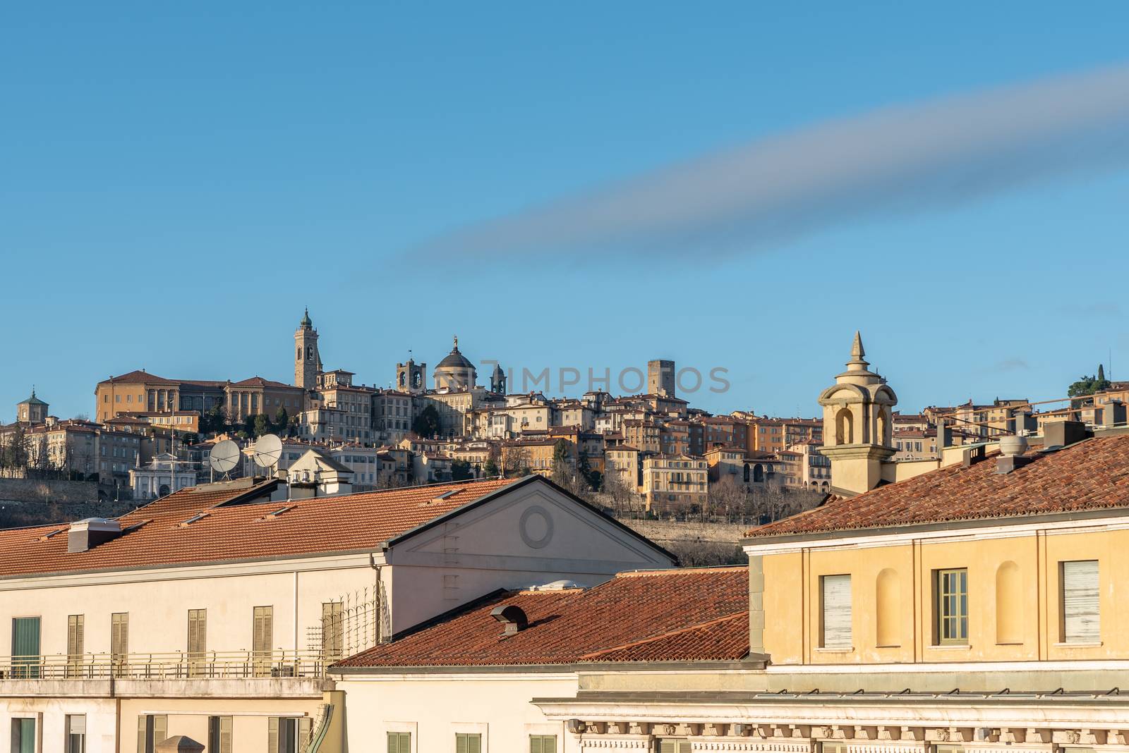 View of Bergamo Alta and the roofs of the lower city on a sunny day