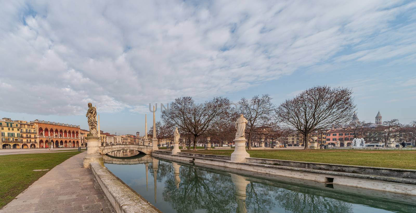 Prato della Valle, square in the city of Padua with the Memmia island surrounded by a canal surrounded by 87 statues, Italian cityscape