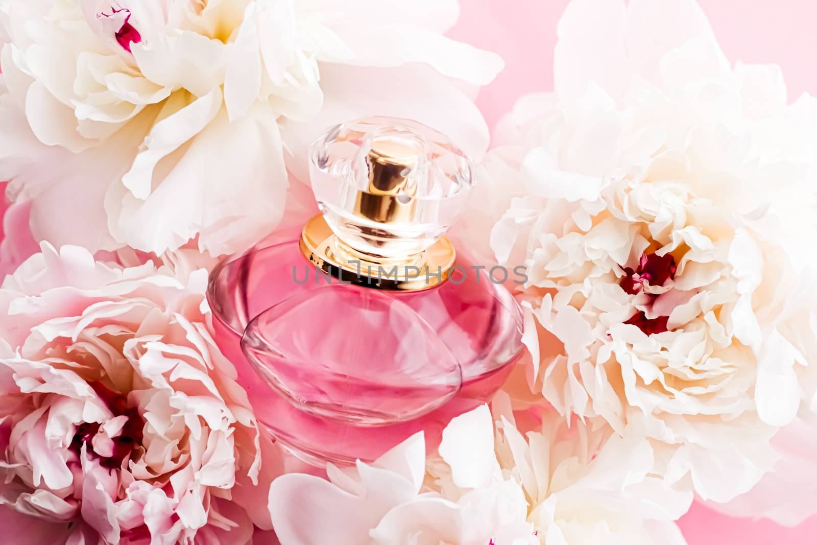 Luxurious fragrance bottle as chic perfume product on background of peony flowers, parfum ad and beauty branding by Anneleven