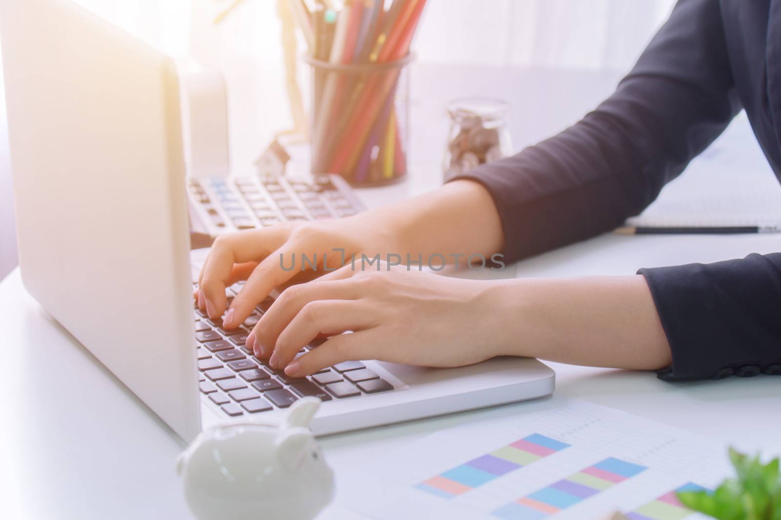 A young business woman using laptop computer on the table, Looking for direction and inspiration.