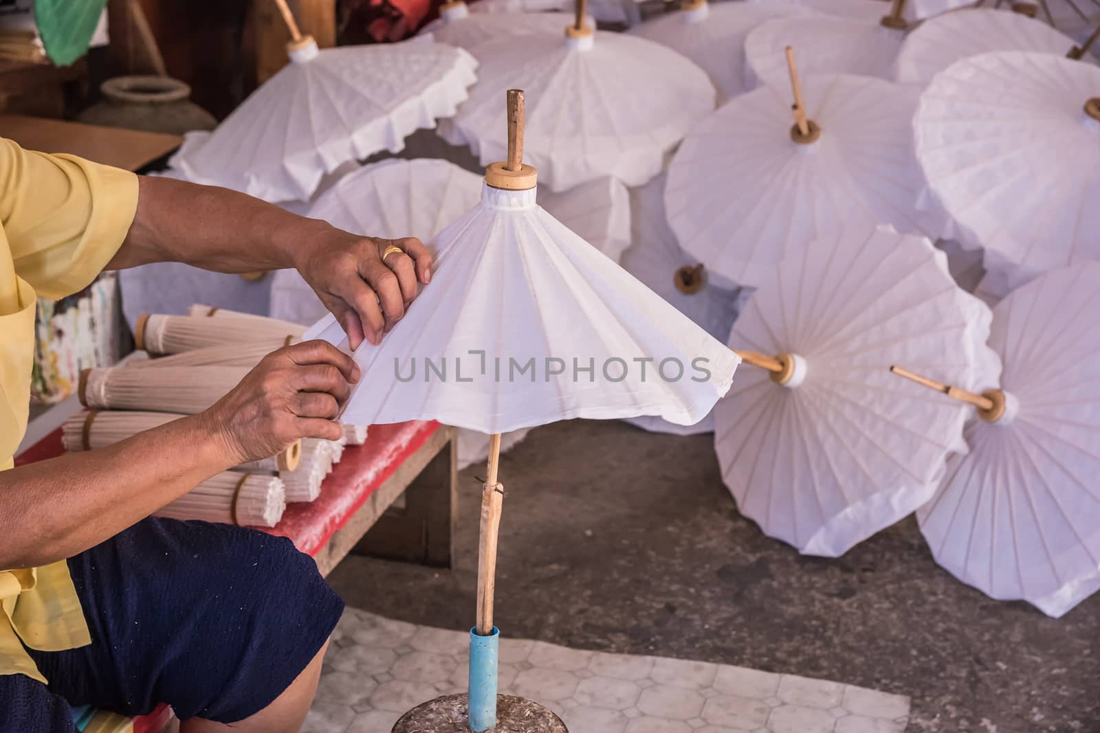 Cover and glue on umbrella. by NuwatPhoto